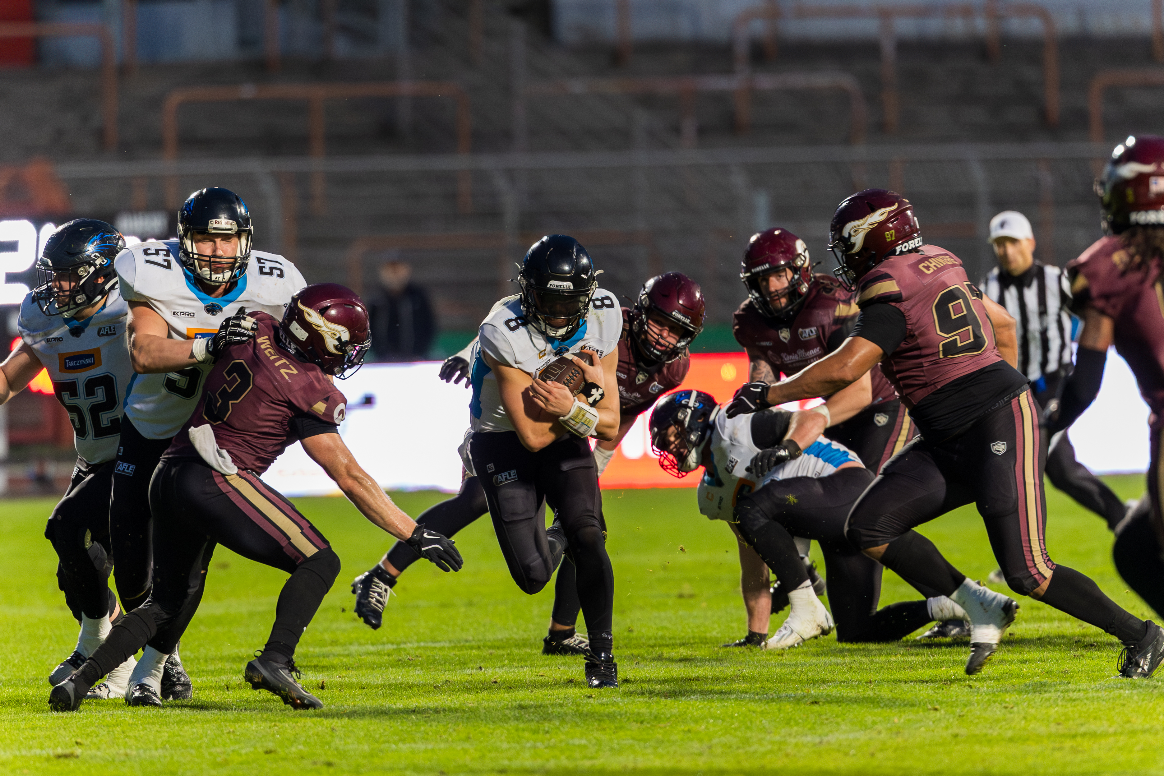 #8 Jameson Wang (Quarterback) – Panthers Wroclaw run with the ball.