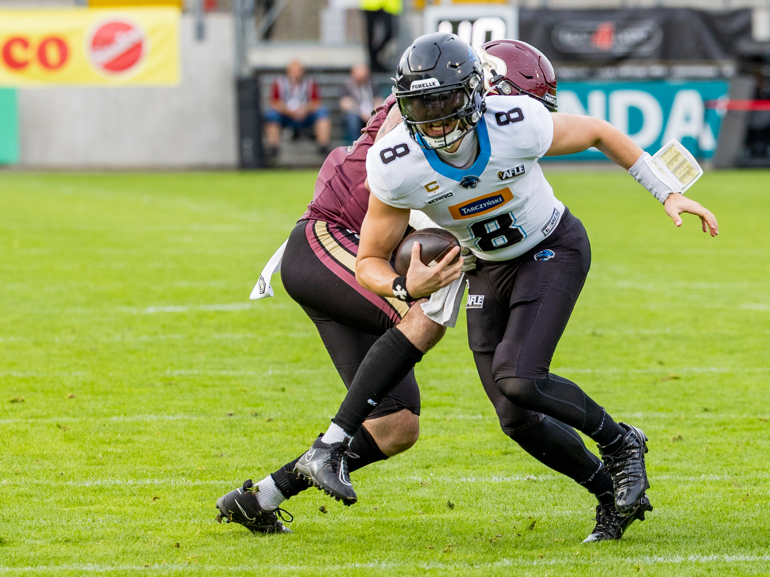#8 Jameson Wang (Quarterback) – Panthers Wroclaw run with the ball.