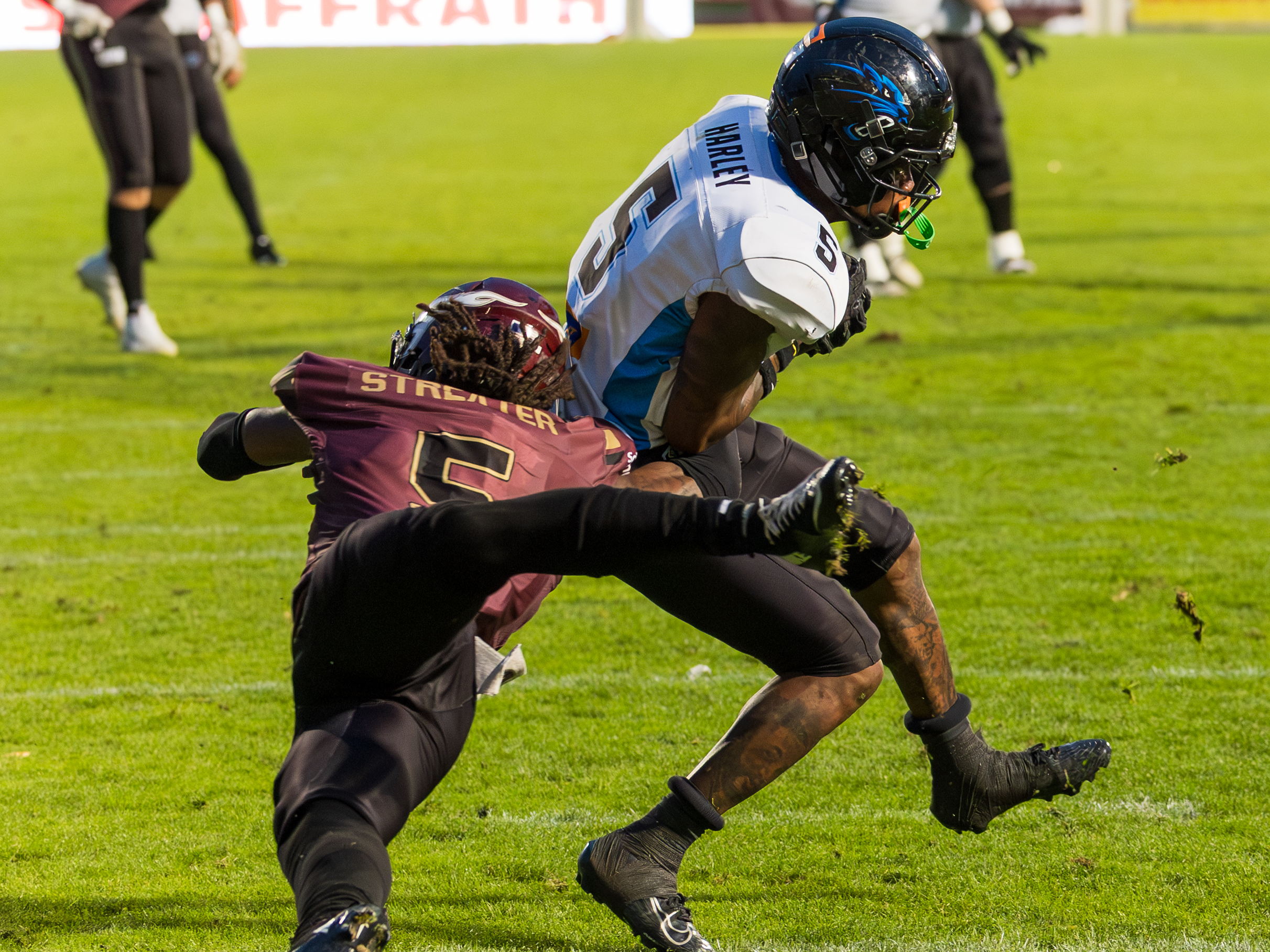 #5 Nazir Streater (Strong Saftey) – Rhein Fire jump to tackle. #5 Michael Harley Jr (Wide Receiver) – Panthers Wroclaw run with the ball.