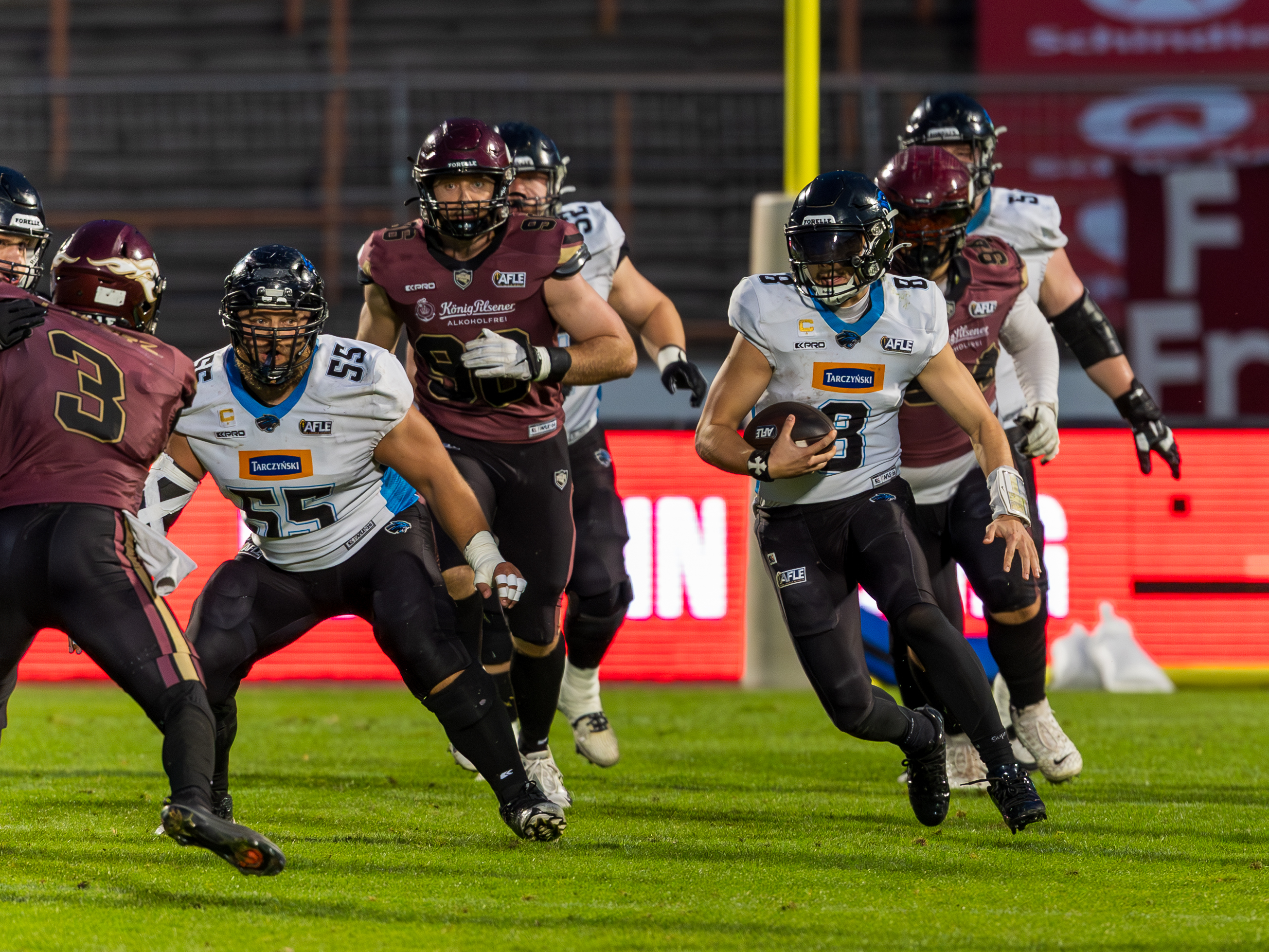 #8 Jameson Wang (Quarterback) – Panthers Wroclaw run with the ball.