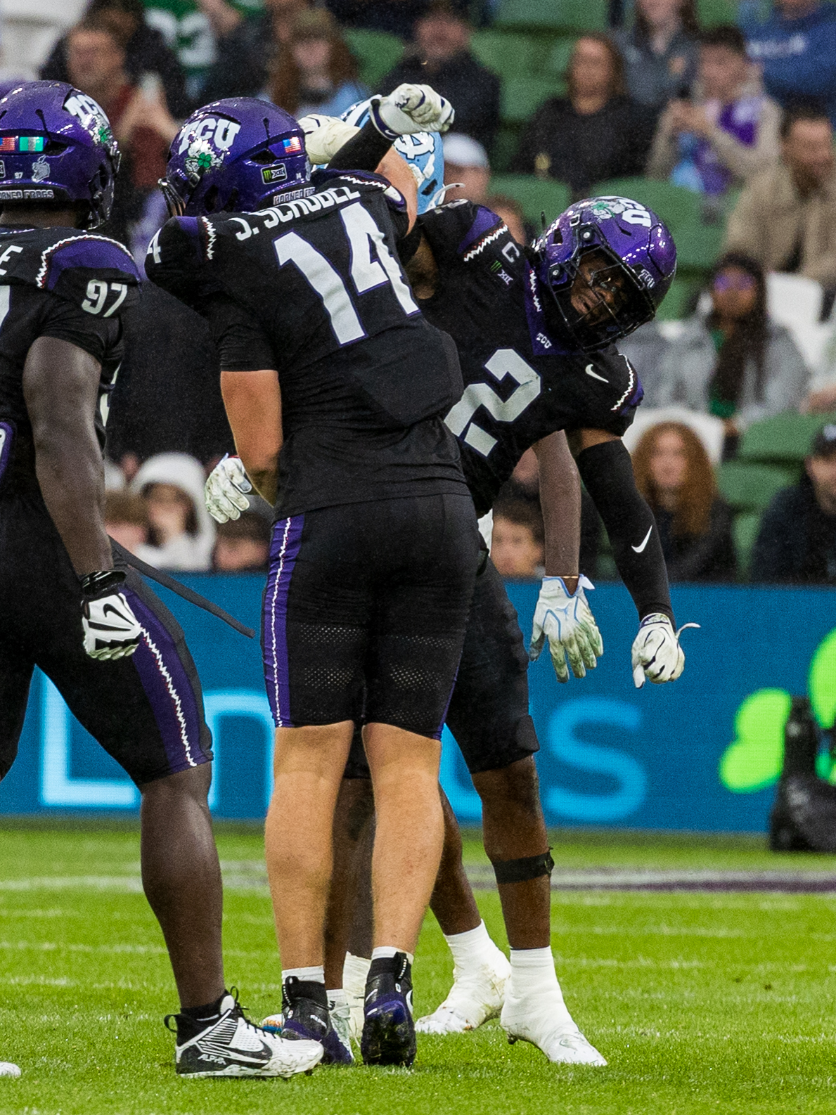 Tackle celebration from #14 John Schobel (EDGE) TCU Horned Frogs and #2 Jamel Johnson (S) TCU Horned Frogs