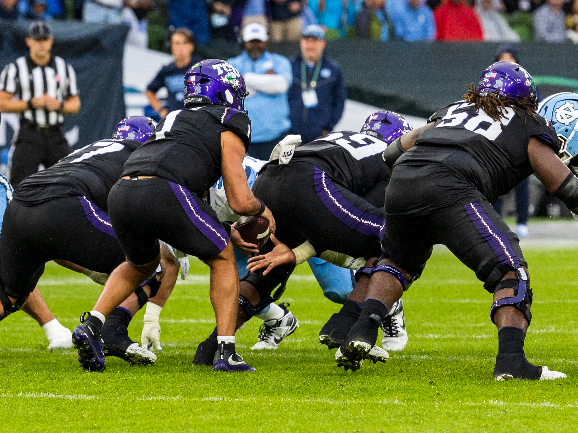 #1 Jaden Craig (QB) TCU Horned Frogs catch the ball from the center.