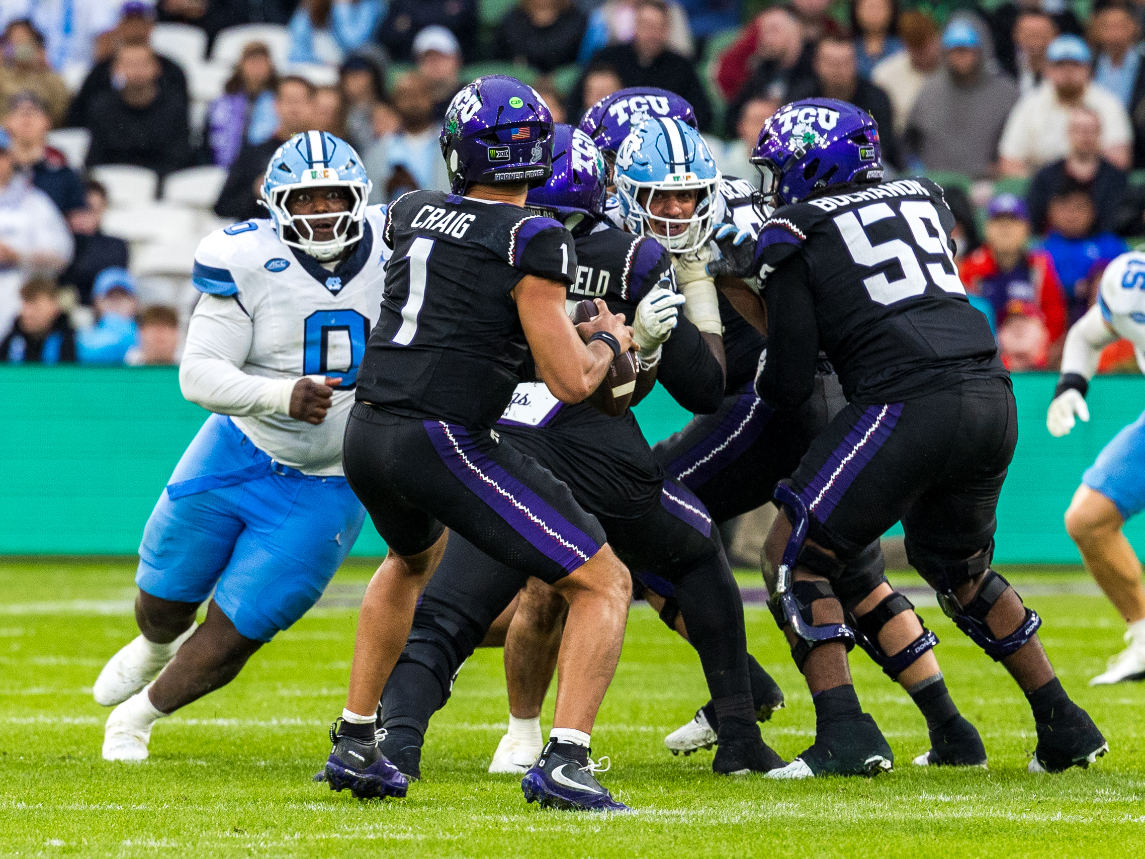 #0 Isaiah Johnson (DL) University of North Carolina Tar Heels run to #1 Jaden Craig (QB) TCU Horned Frogs