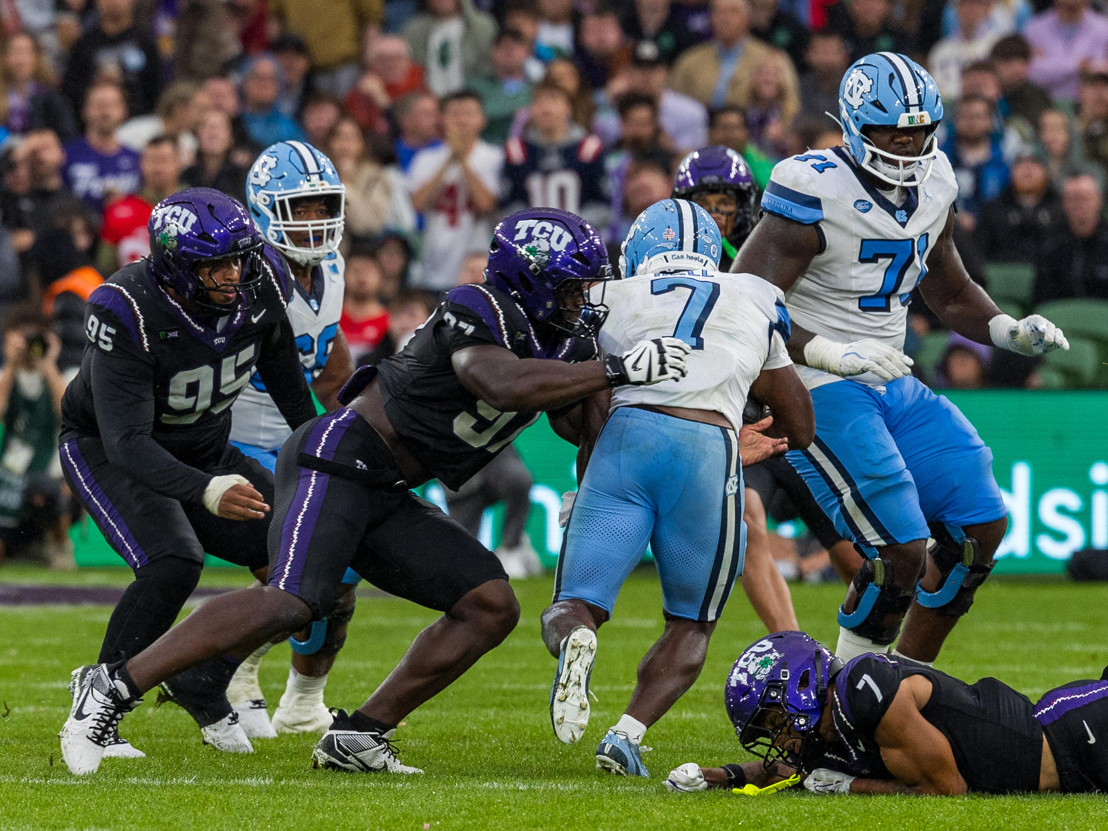 #97 Paul Oyewale (EDGE) TCU Horned Frogs tackle #7 Benjamin Hall (RB) University of North Carolina Tar Heels