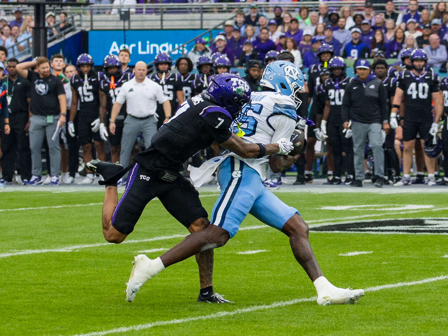 #7 Julius Simms (S) TCU Horned Frogs tackle #45 Jelani Thurman (TE) University of North Carolina Tar Heels