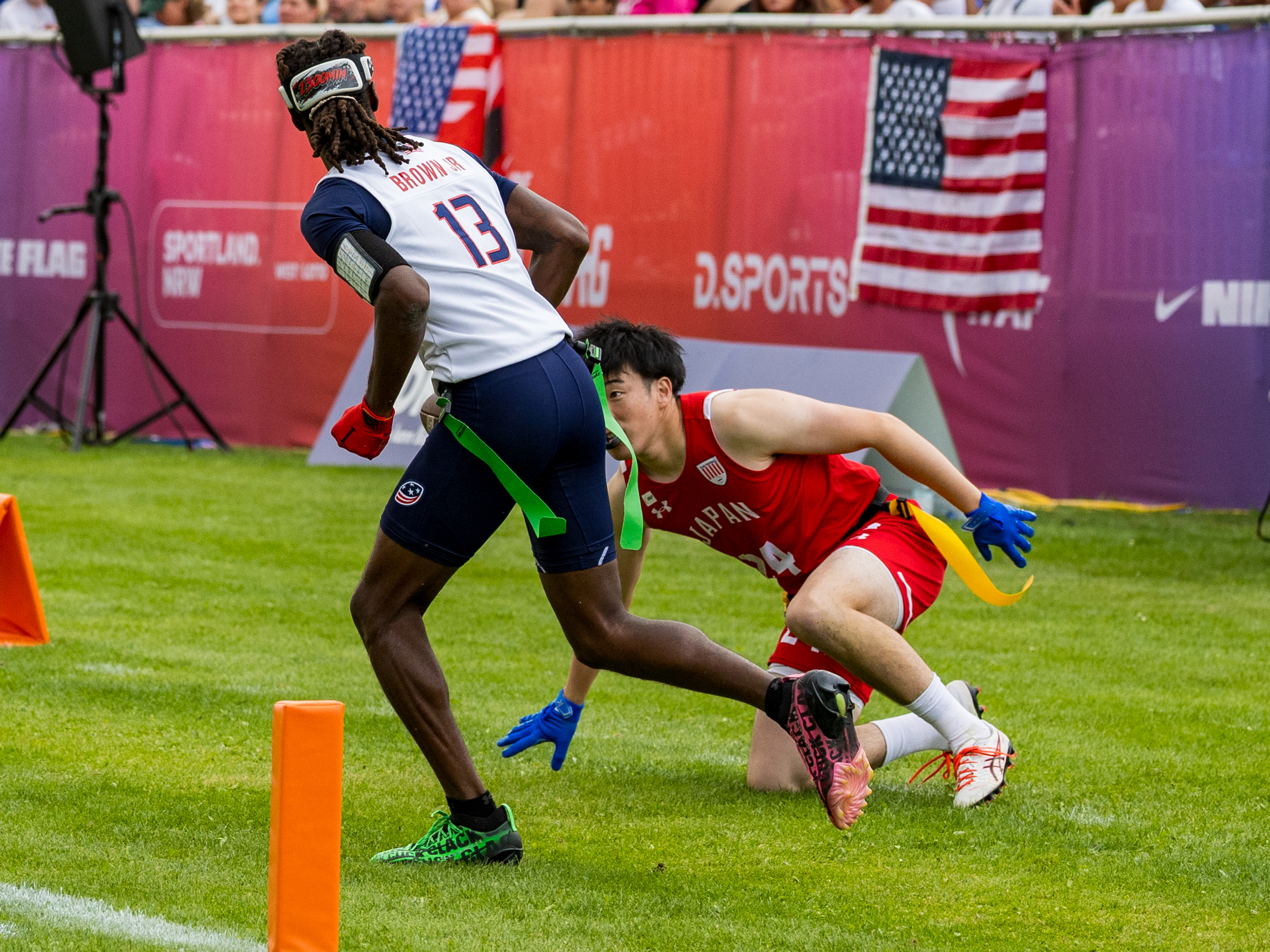 #24 KENTO NISHIDA ( DB/WR ) Team Japan Men and #13 Velton Brown Jr (WR/DB) Team USA Men out the field.
