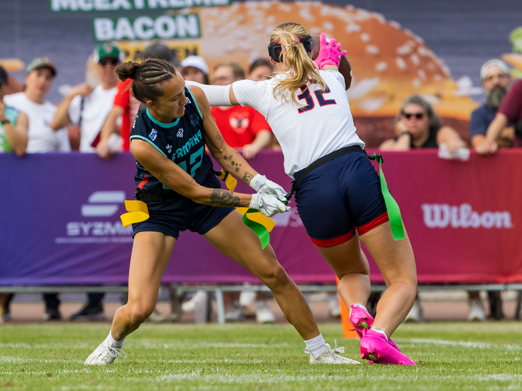 #82 Zoe Kwandae Song (DB) Team Germany Women catch the flag from #32 Ashlea Klam (C/S) Team USA Women
