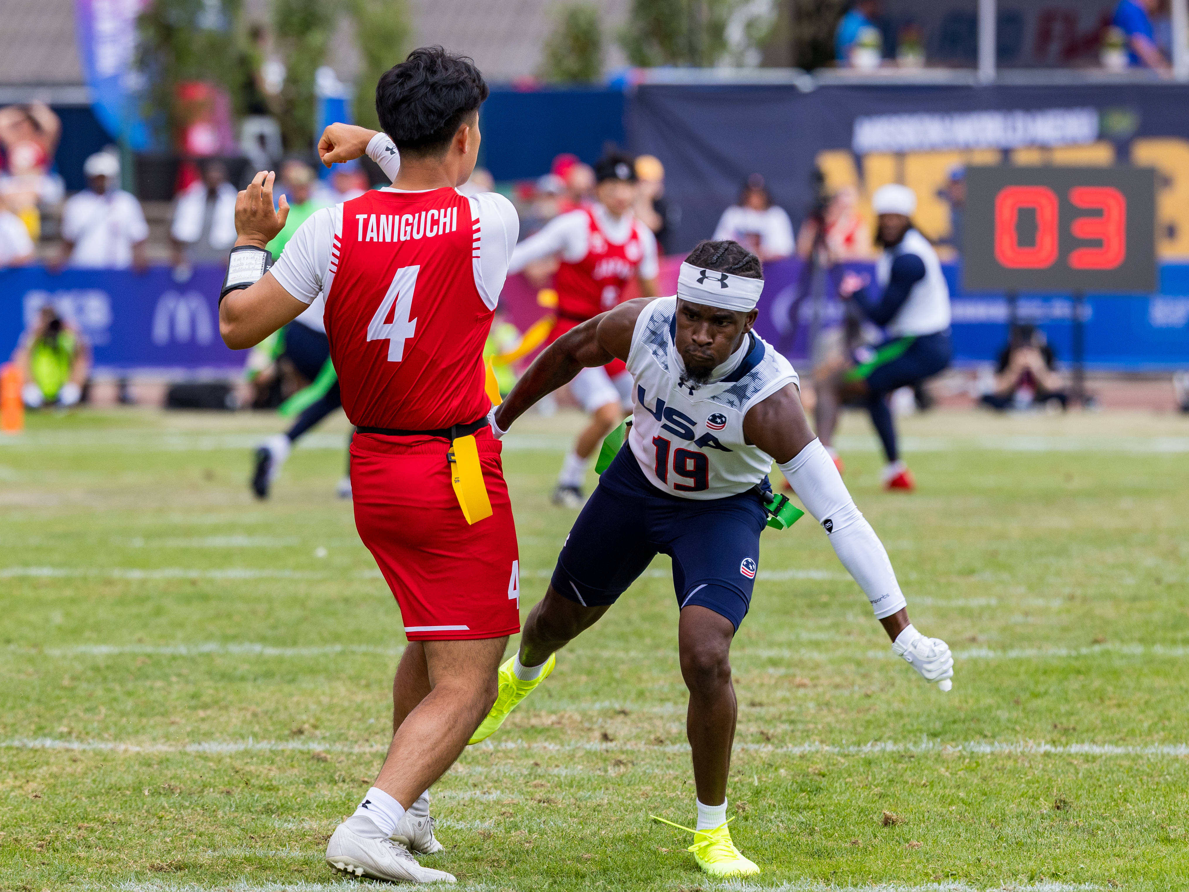 #19 Shawn Theard Jr (ATH) Team USA Men to late for a sack #4 TAKEHITO TANIGUCHI ( QB ) Team Japan Men