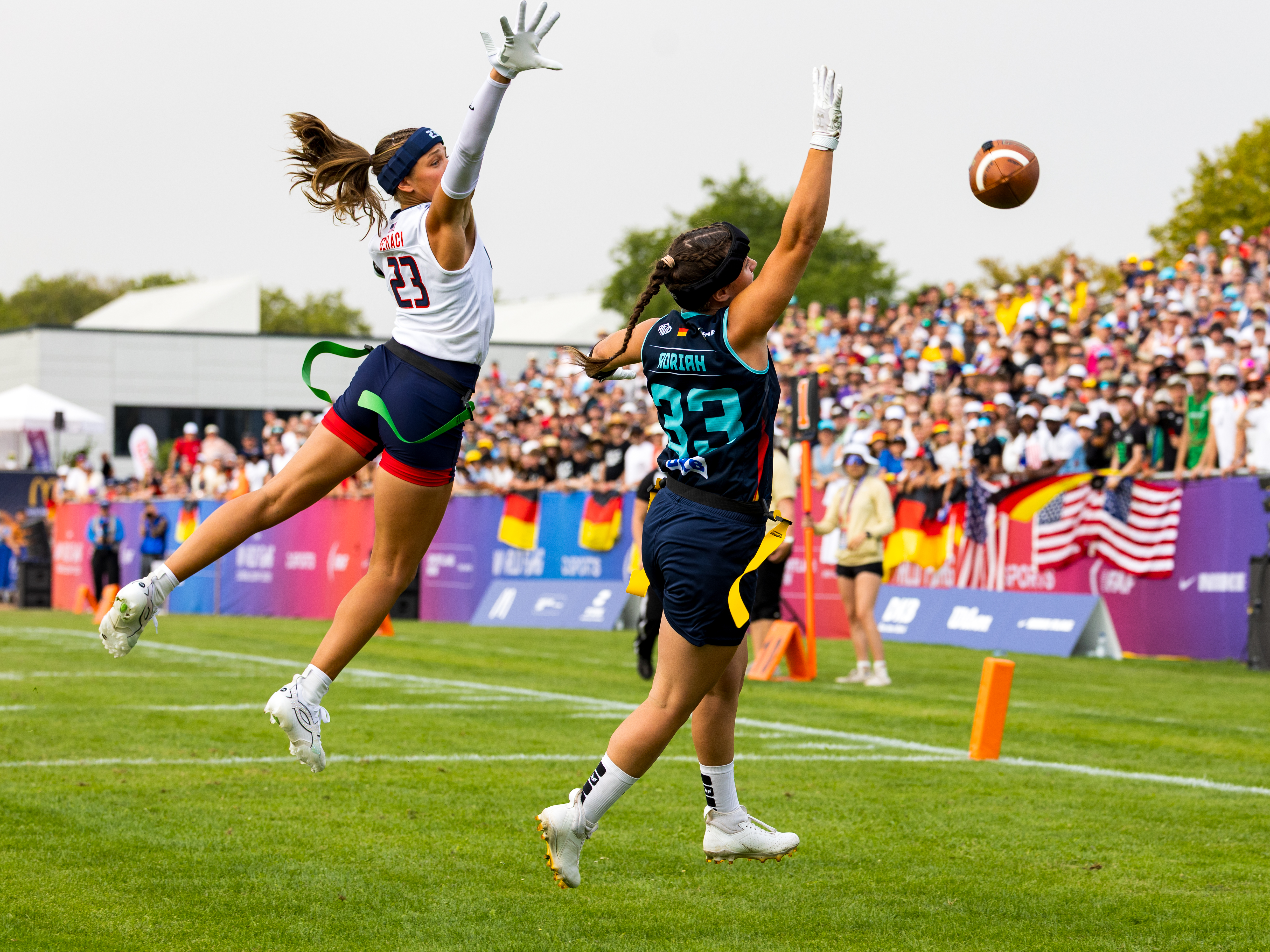 Pass to long for catch for #33 Lina Kristin Adrian (WR/DB) Team Germany Women or #23 Isabella Geraci (WR/S) Team USA Women for a interception