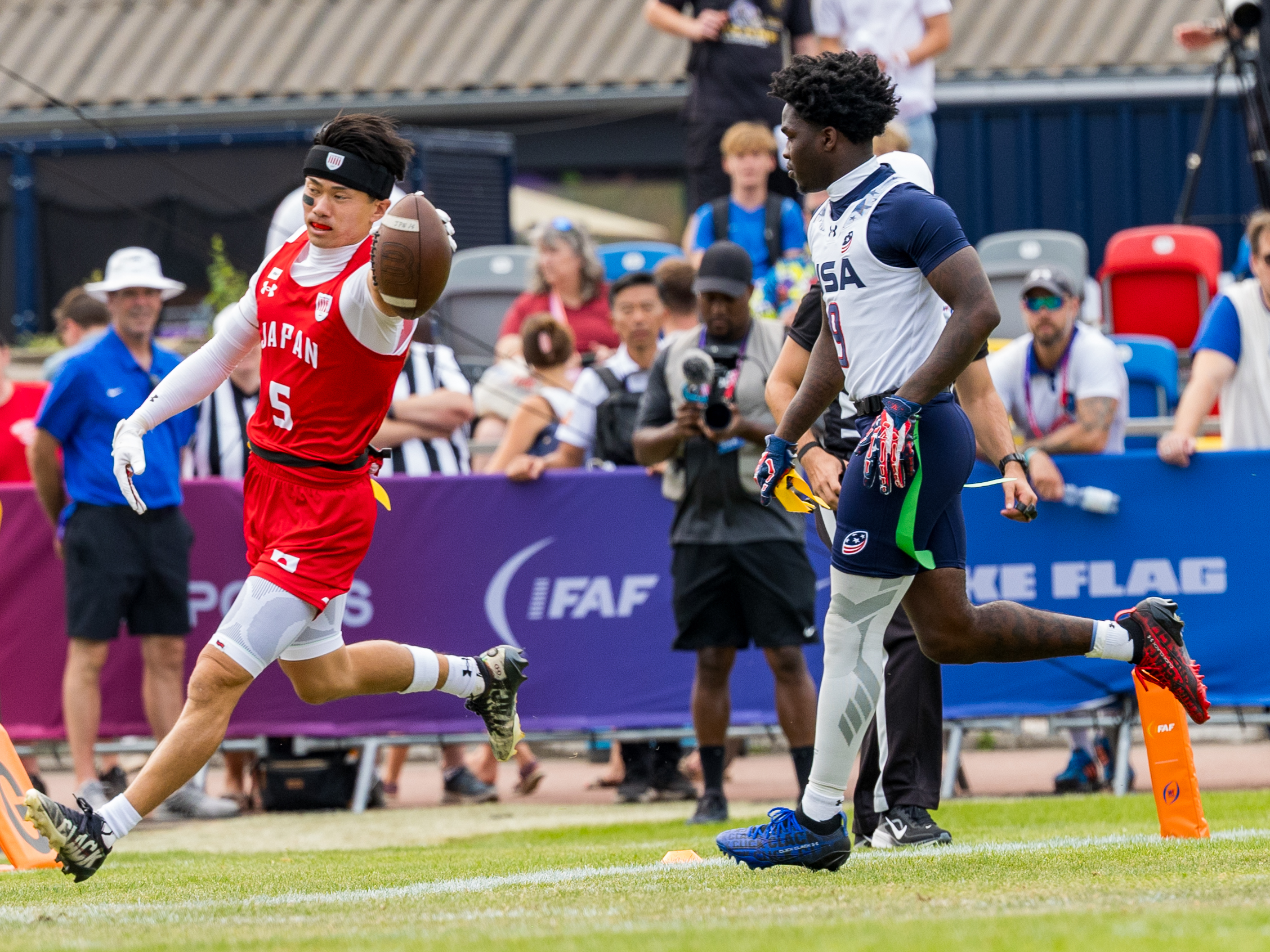 #5 RYOSUKE MATSUO ( WR/DB ) Team Japan Men run with ball out the field.