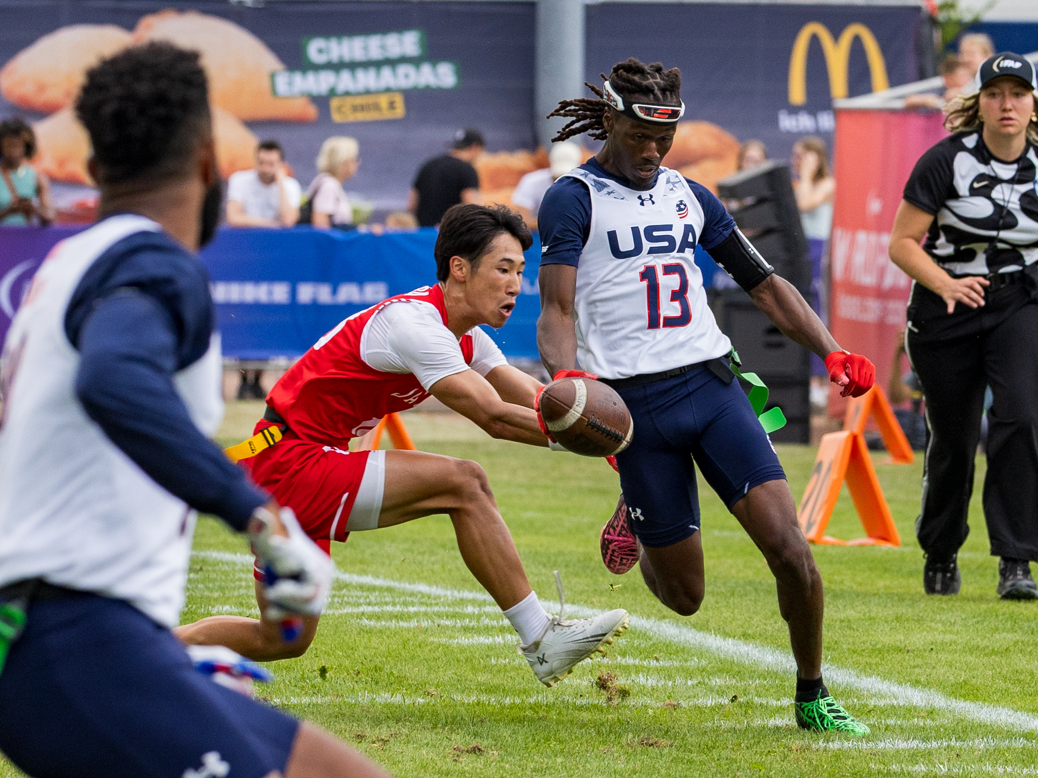 #13 Velton Brown Jr (WR/DB) Team USA Men run with the ball. A tackle from #24 KENTO NISHIDA ( DB/WR ) Team Japan Men
