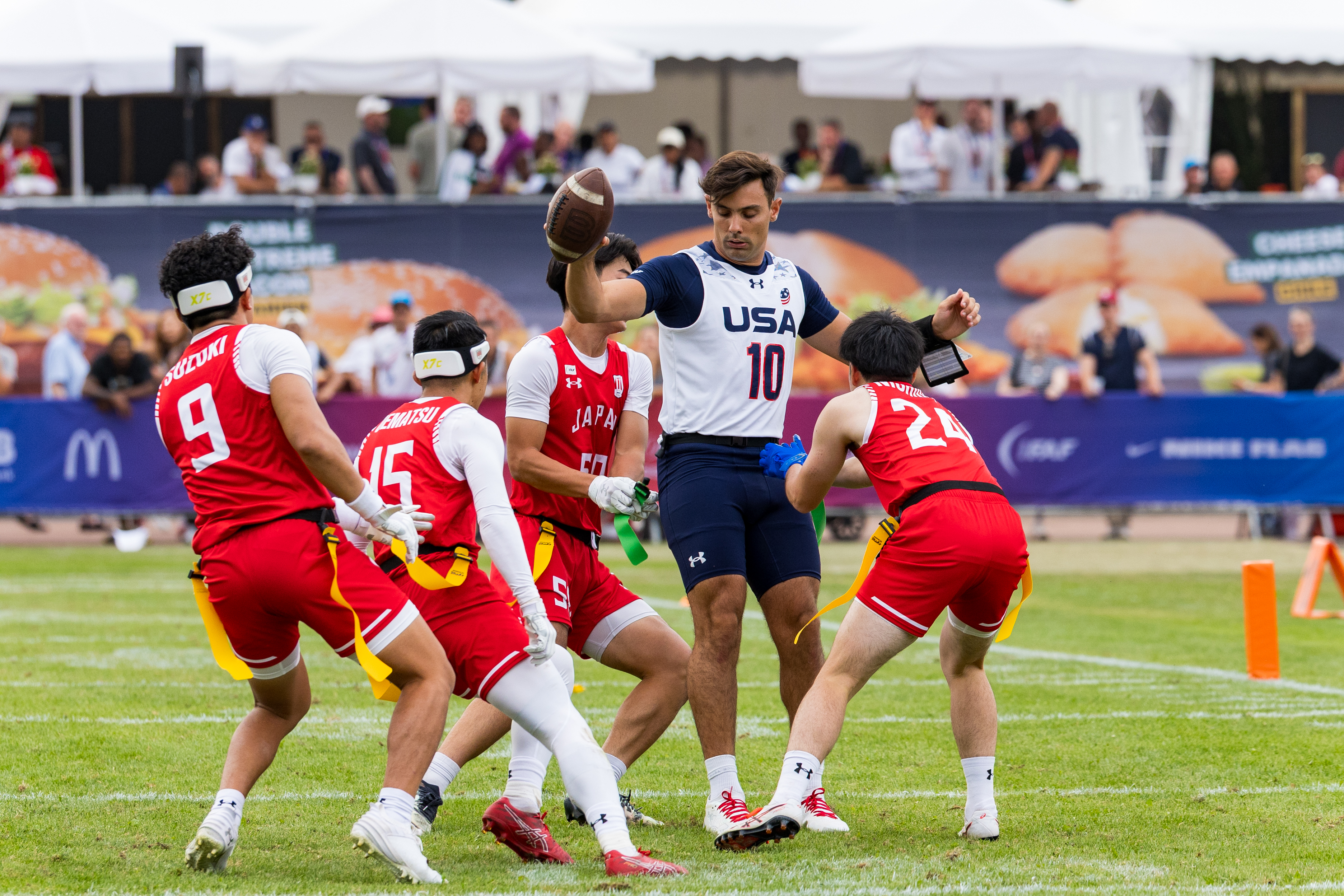 #15 RYOHEI UEMATSU ( DB/WR ) Team Japan Men and #24 KENTO NISHIDA ( DB/WR ) Team Japan Men stop #10 Nicholas "Nico" Casares (QB) Team USA Men