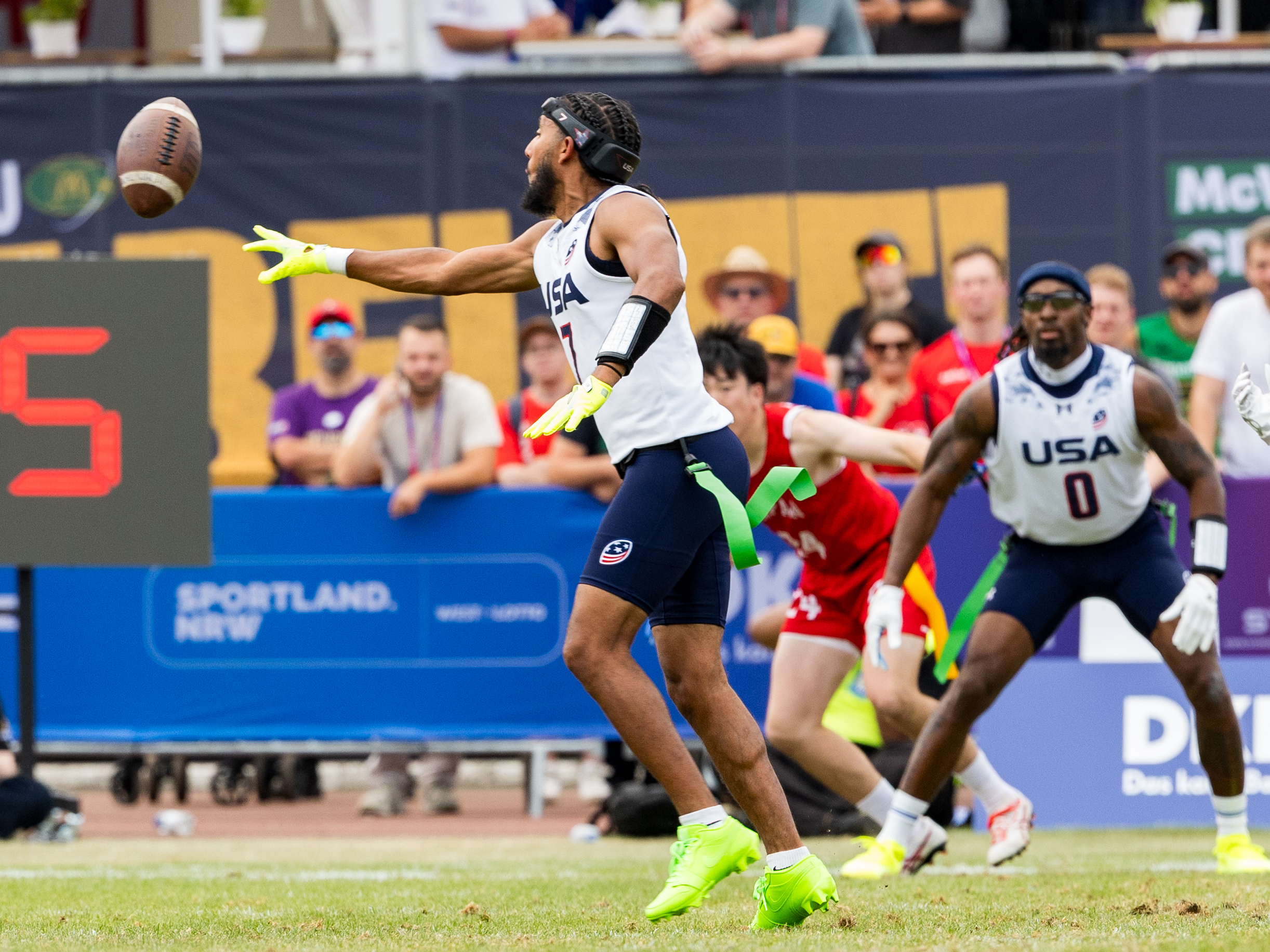 #7 Darrell "Housh" Doucette III (QB/ATH) Team USA Men pitch the ball to a player#