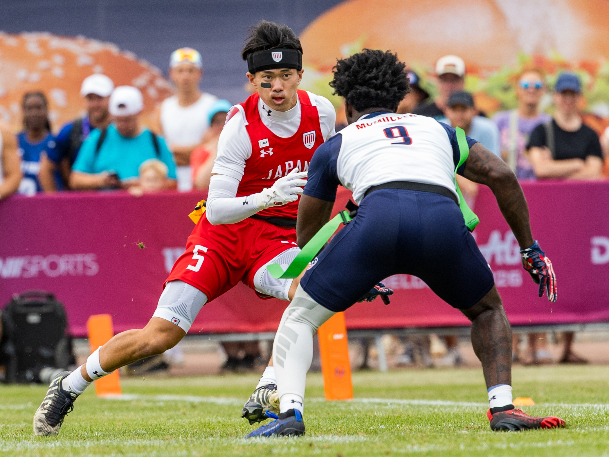 #9 Justin McMullen (DB/C) Team USA Men tackle #5 RYOSUKE MATSUO ( WR/DB ) Team Japan Men