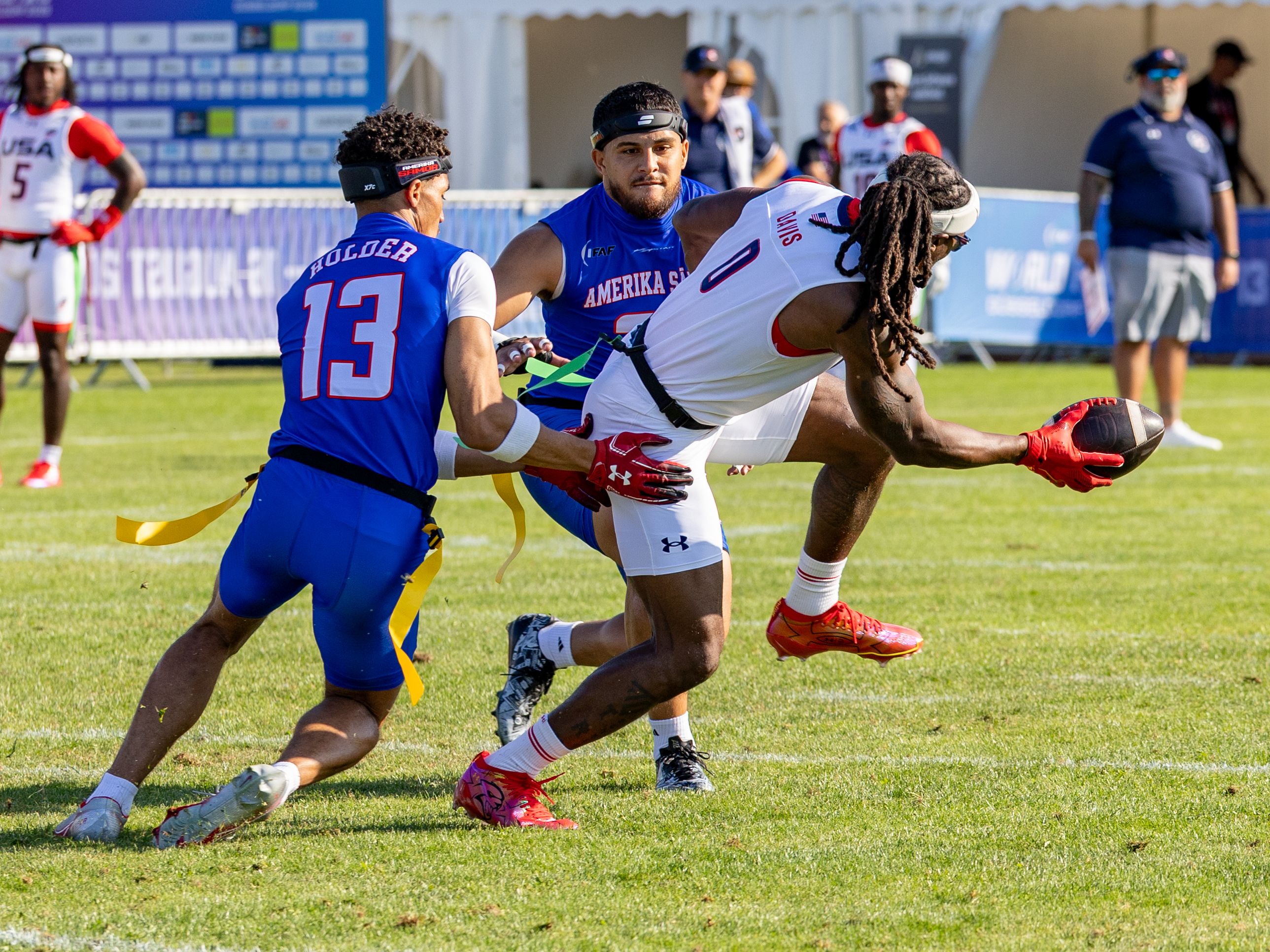 #13 Alijah Isaiah Holder (WR/DB) Team American Samoa Men catch the flag from US Player.