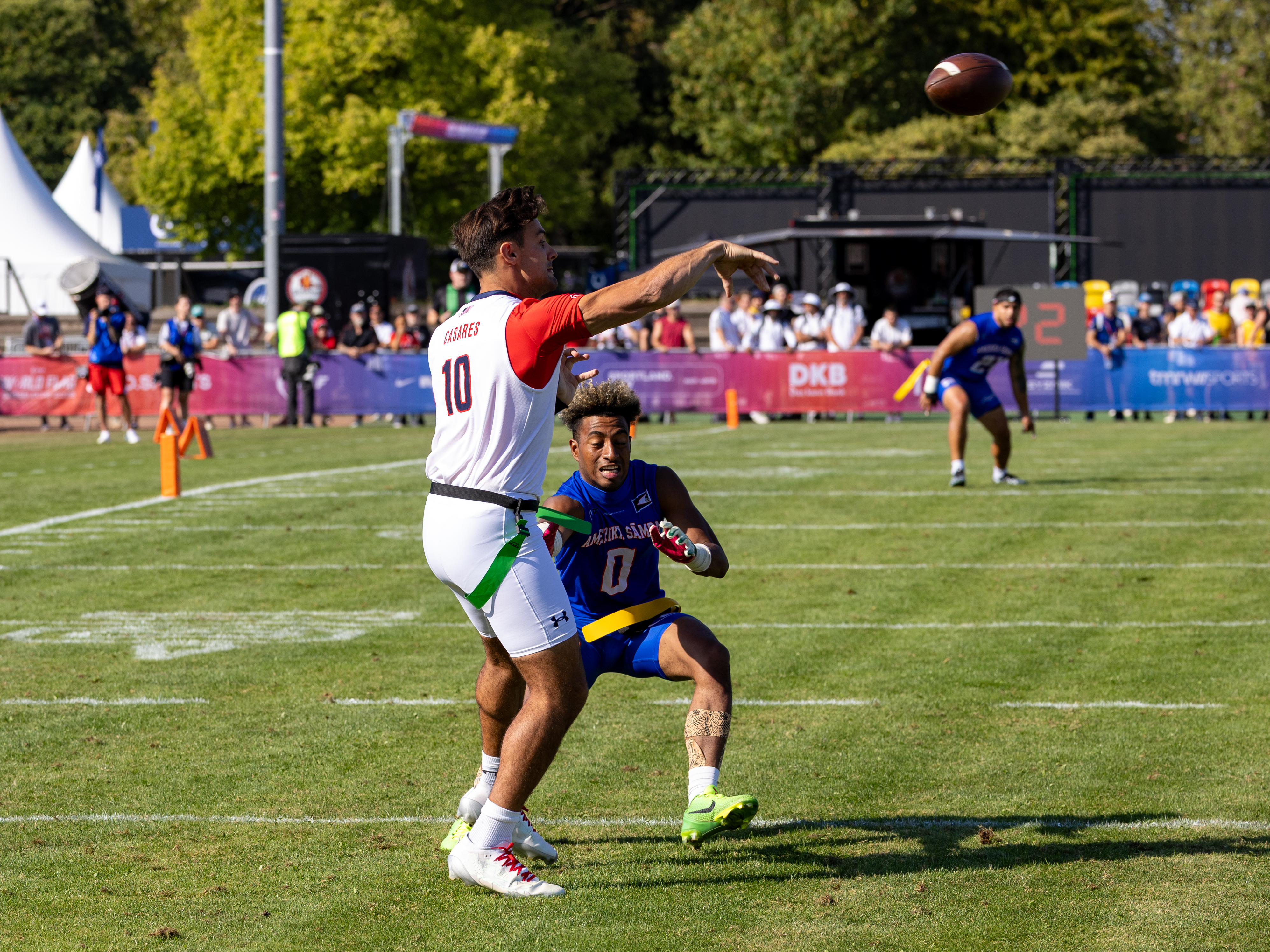 #10 Nicholas "Nico" Casares (QB) pass the ball. #0 Batchlor Wise Johnson IV (WR/DB) Team American Samoa Men to late for catch the flag.