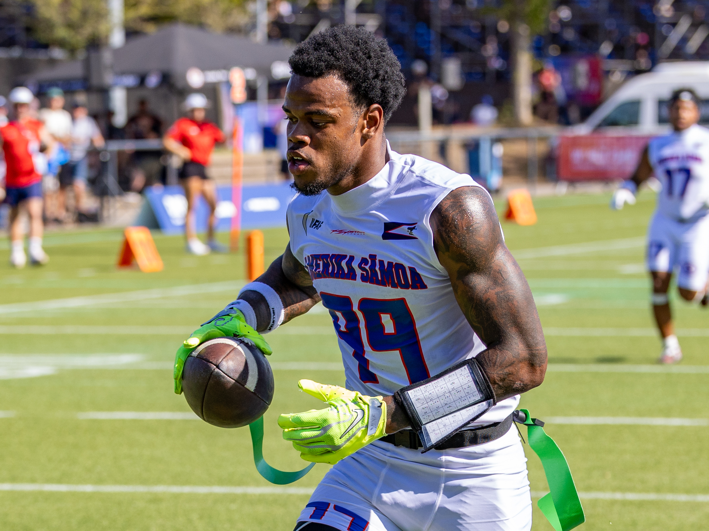 #99 Bralon Brown (WR/DB) Team American Samoa Men run with the ball.