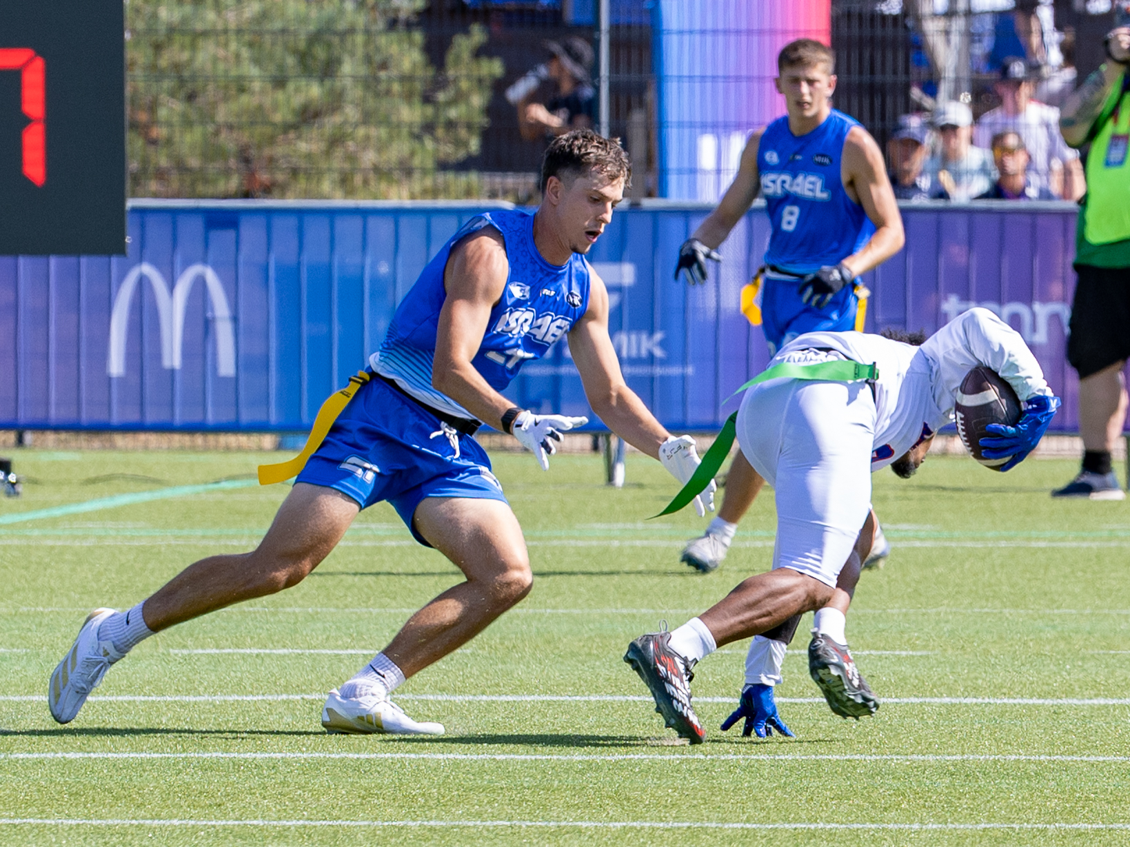 #7 MATTHEW KENNY (DB) Team Israel Men follow the #9 Jahcour Hasaan Pearson (WR/DB) Team American Samoa Men