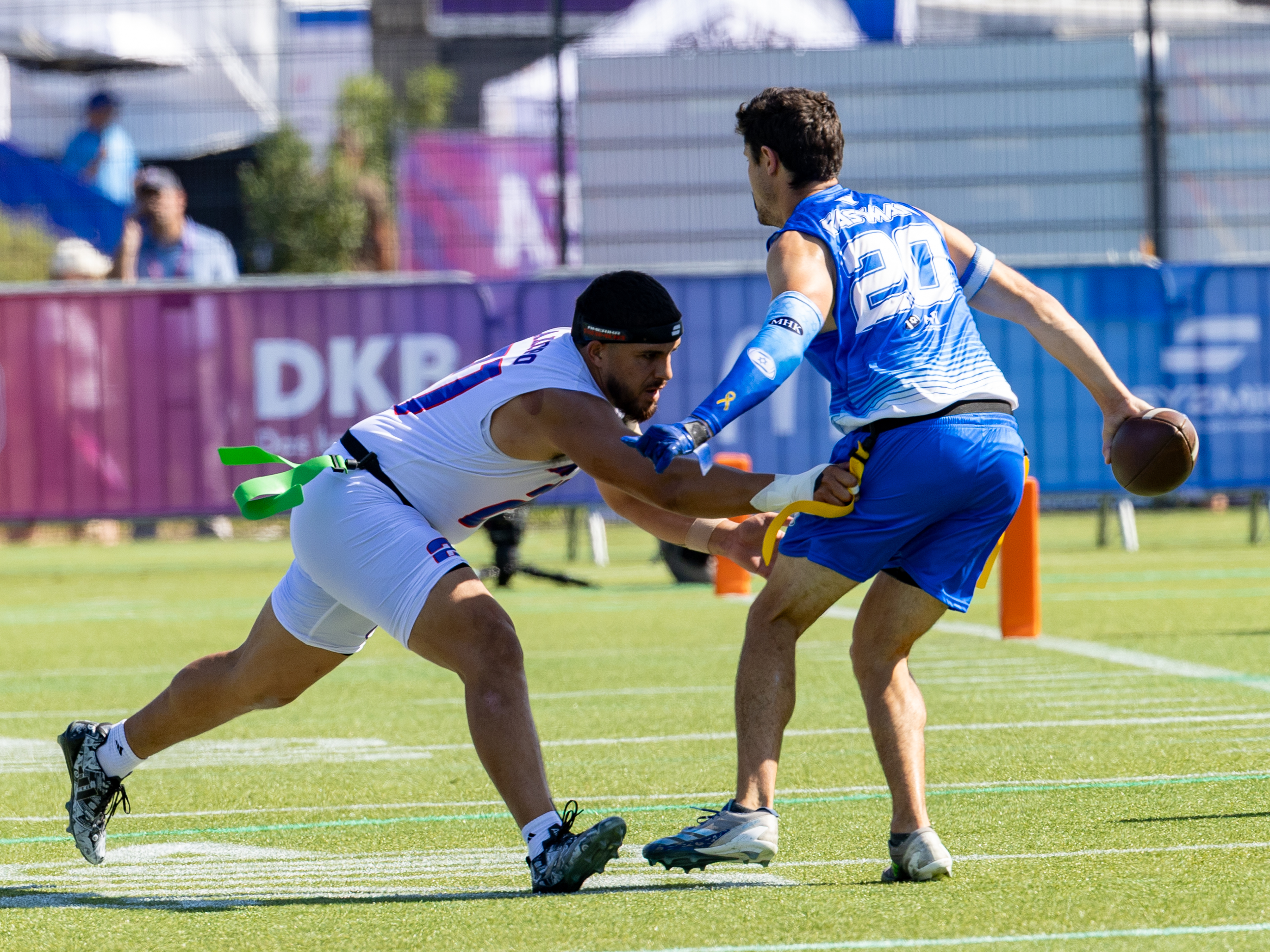 #21 London Constantine Teidemann Iakopo (WR/DB) Team American Samoa Men catch the flag from #20 DANIEL EASTMAN (DB) Team Israel Men