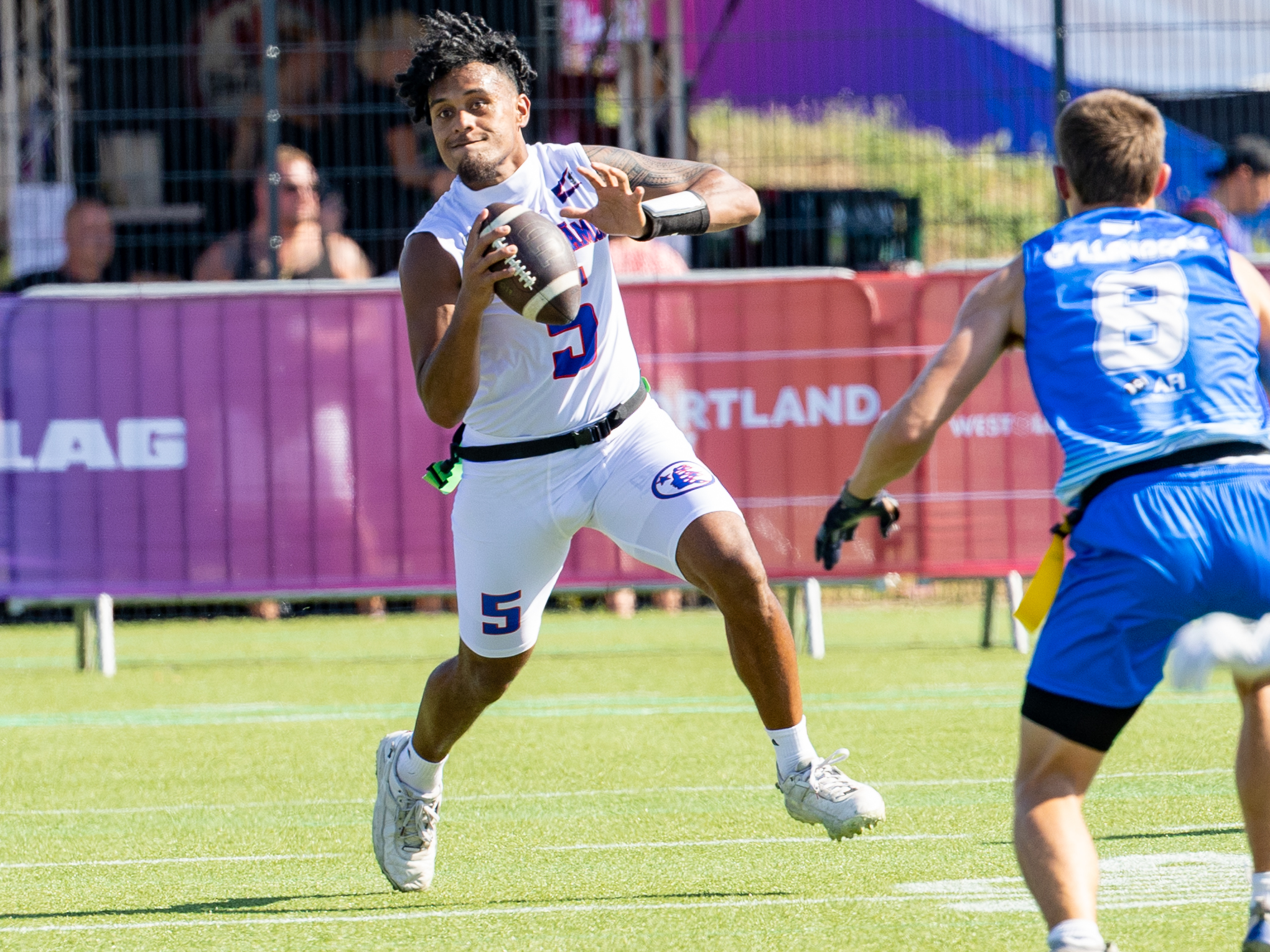 #5 Taulia Tagovailoa (QB) Team American Samoa Men search a target in the run.