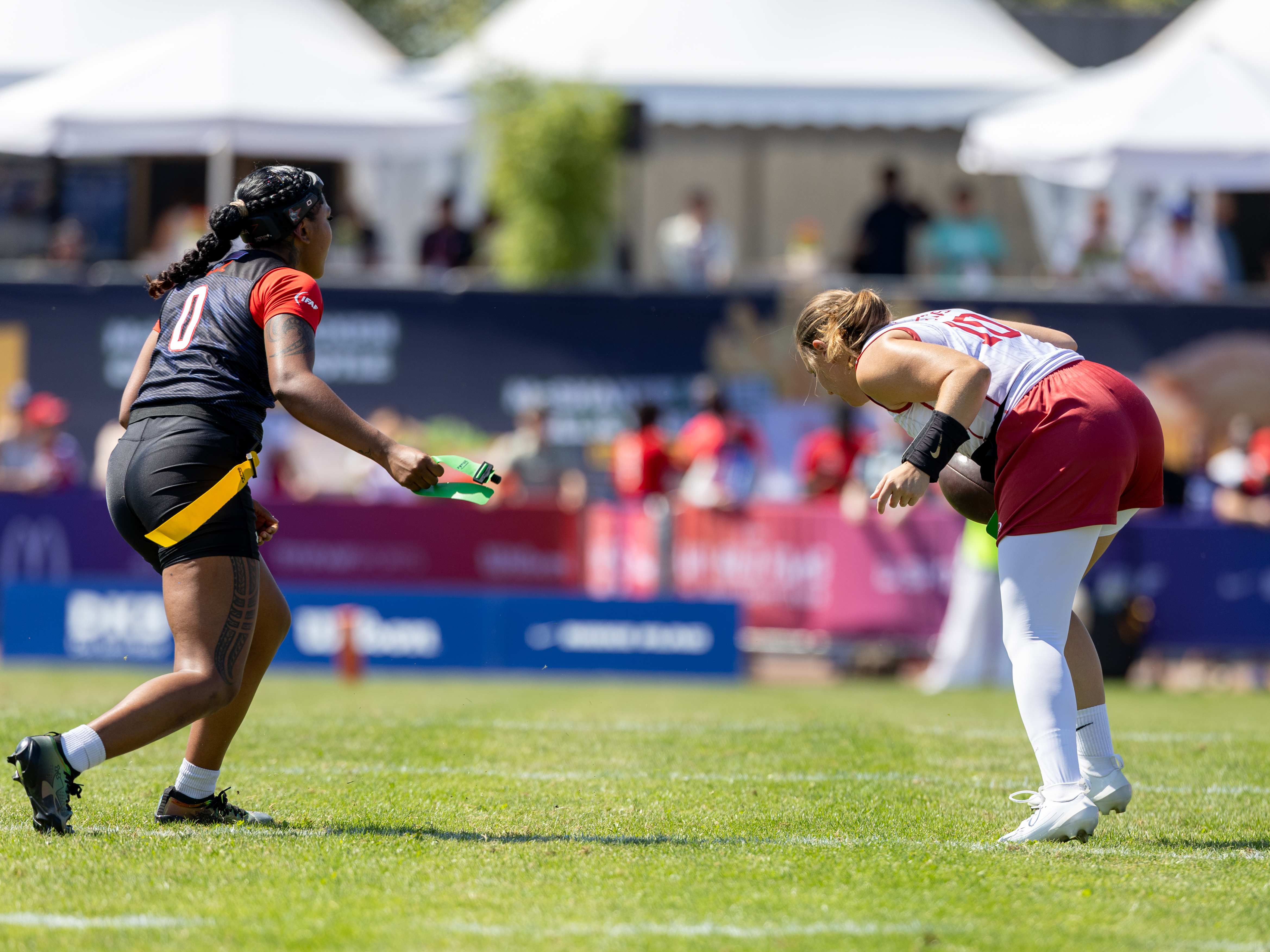 #0 Brooklin Hill (WR/DB) Team USA Women catch the flag from #10 Mónica Rafecas Barceló (QB) Team Spain Women and stop the play