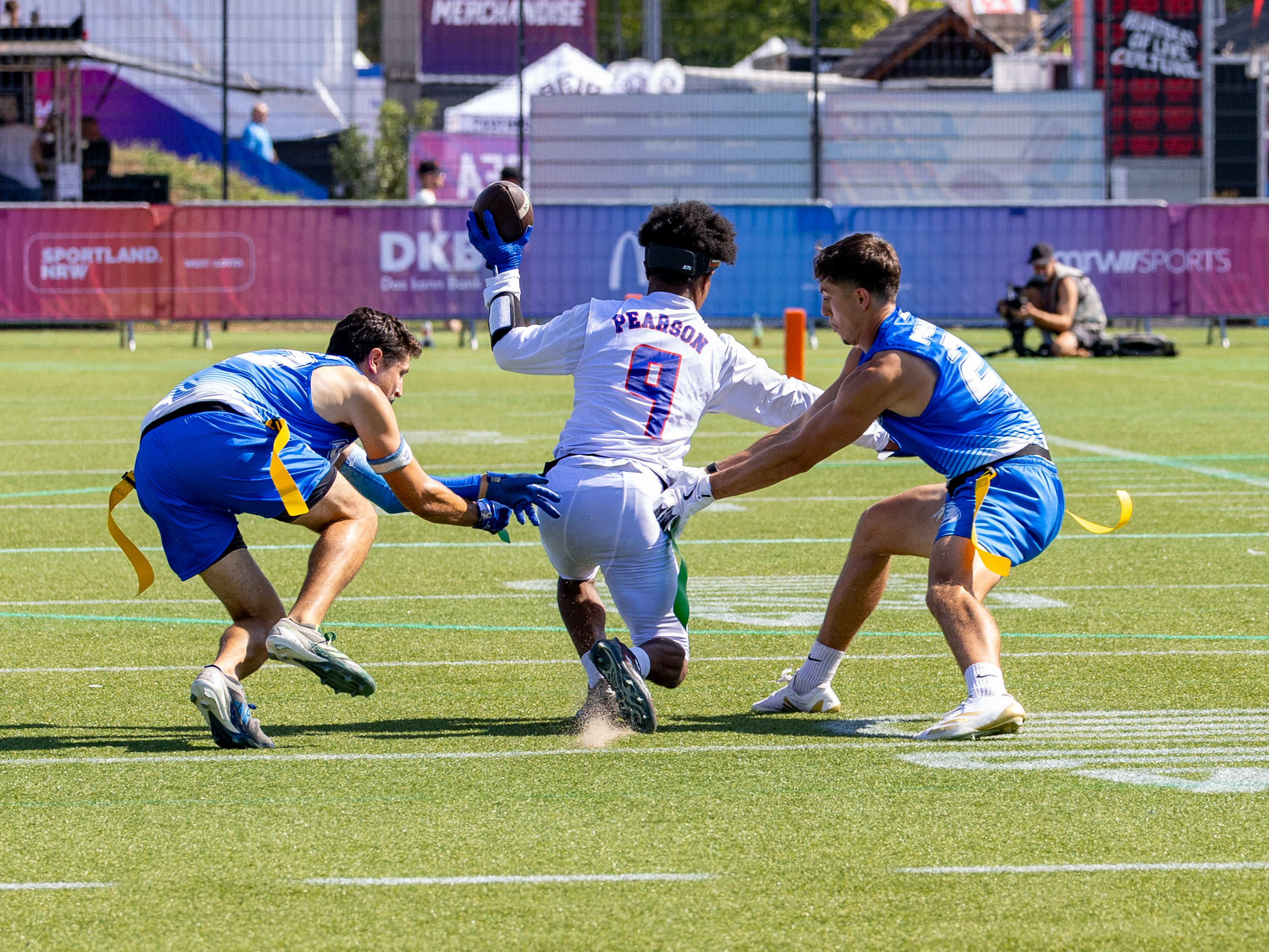 #9 Jahcour Hasaan Pearson (WR/DB) Team American Samoa Men stops from Israel defense.