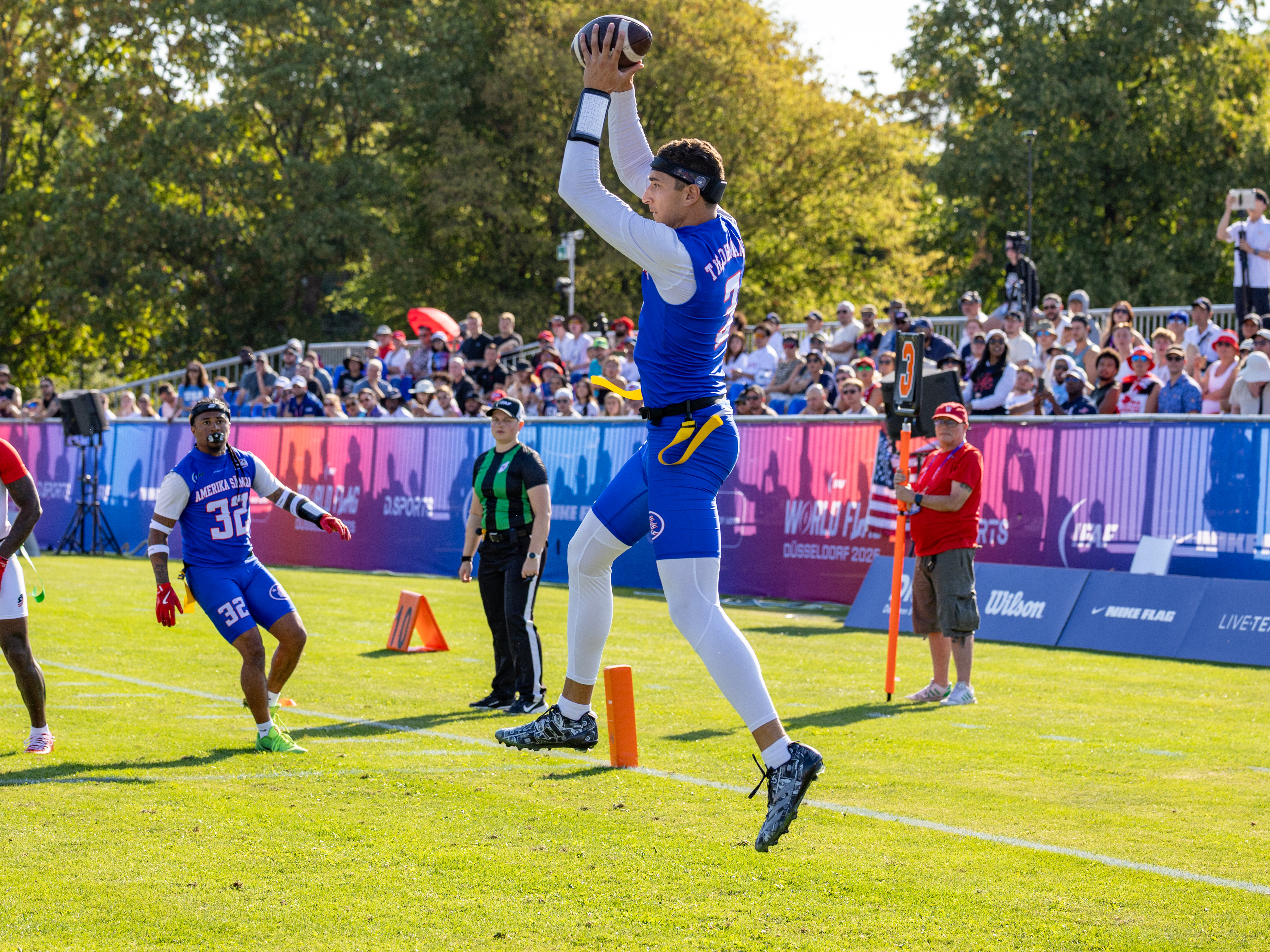 #3 Tai Natani-Othoniel Tiedemann (QB) Team American Samoa Men Catch the ball in the air to a touchdown.