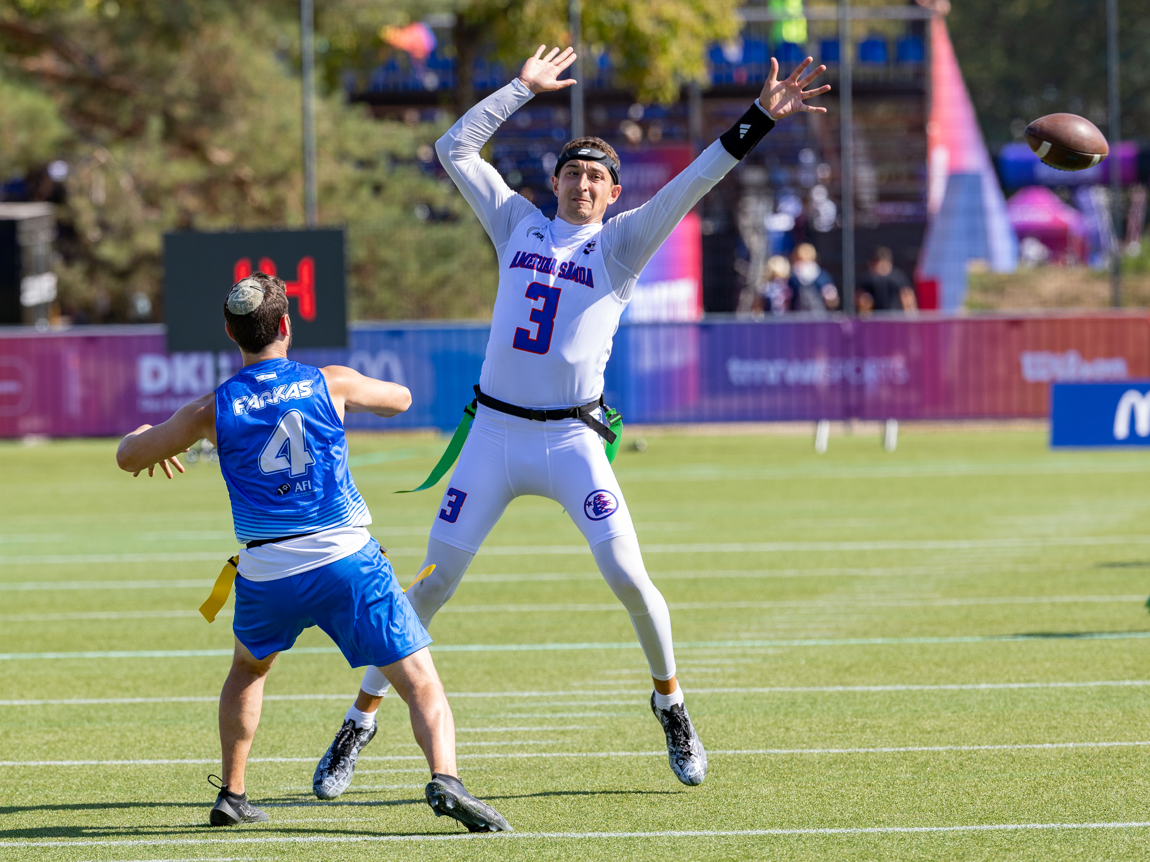 #3 Tai Natani-Othoniel Tiedemann (QB) Team American Samoa Men block the pass from #4 AVRAHAM FARKAS (QB) Team Israel Men