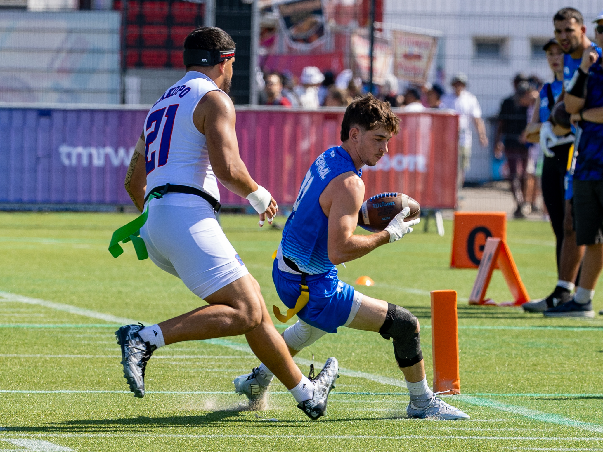 #21 London Constantine Teidemann Iakopo (WR/DB) Team American Samoa Men to late for block. #11 JOSHUA LEVENTHAL (WR) Team Israel Men go outside for a first down