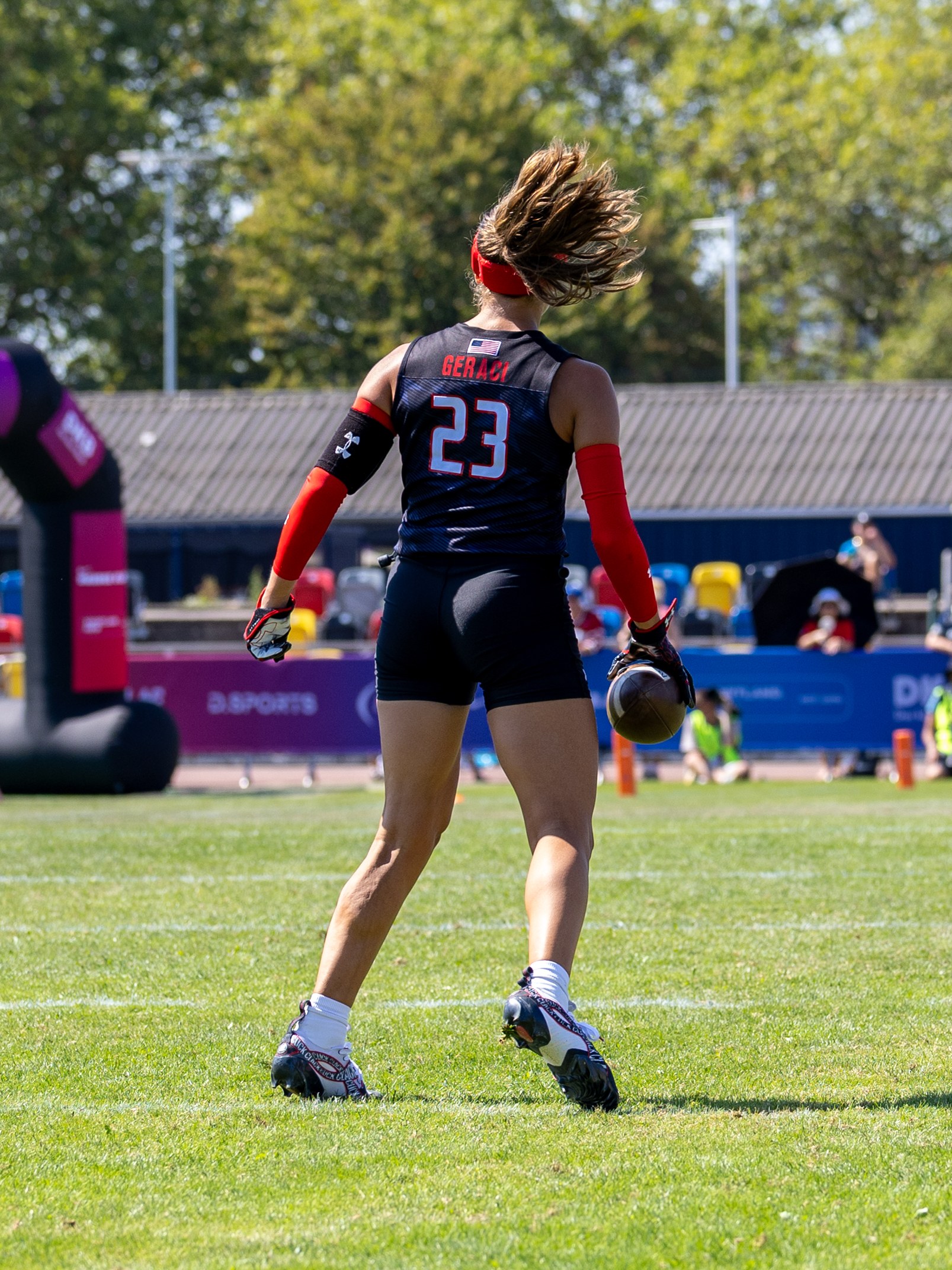 #23 Isabella Geraci (WR/S) Team USA Women catch the ball in the air.