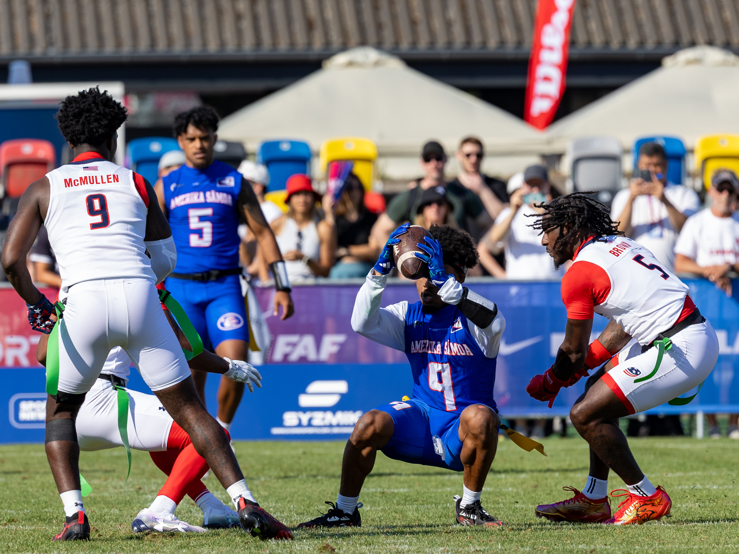 #9 Jahcour Hasaan Pearson (WR/DB) Team American Samoa Men run with the ball.