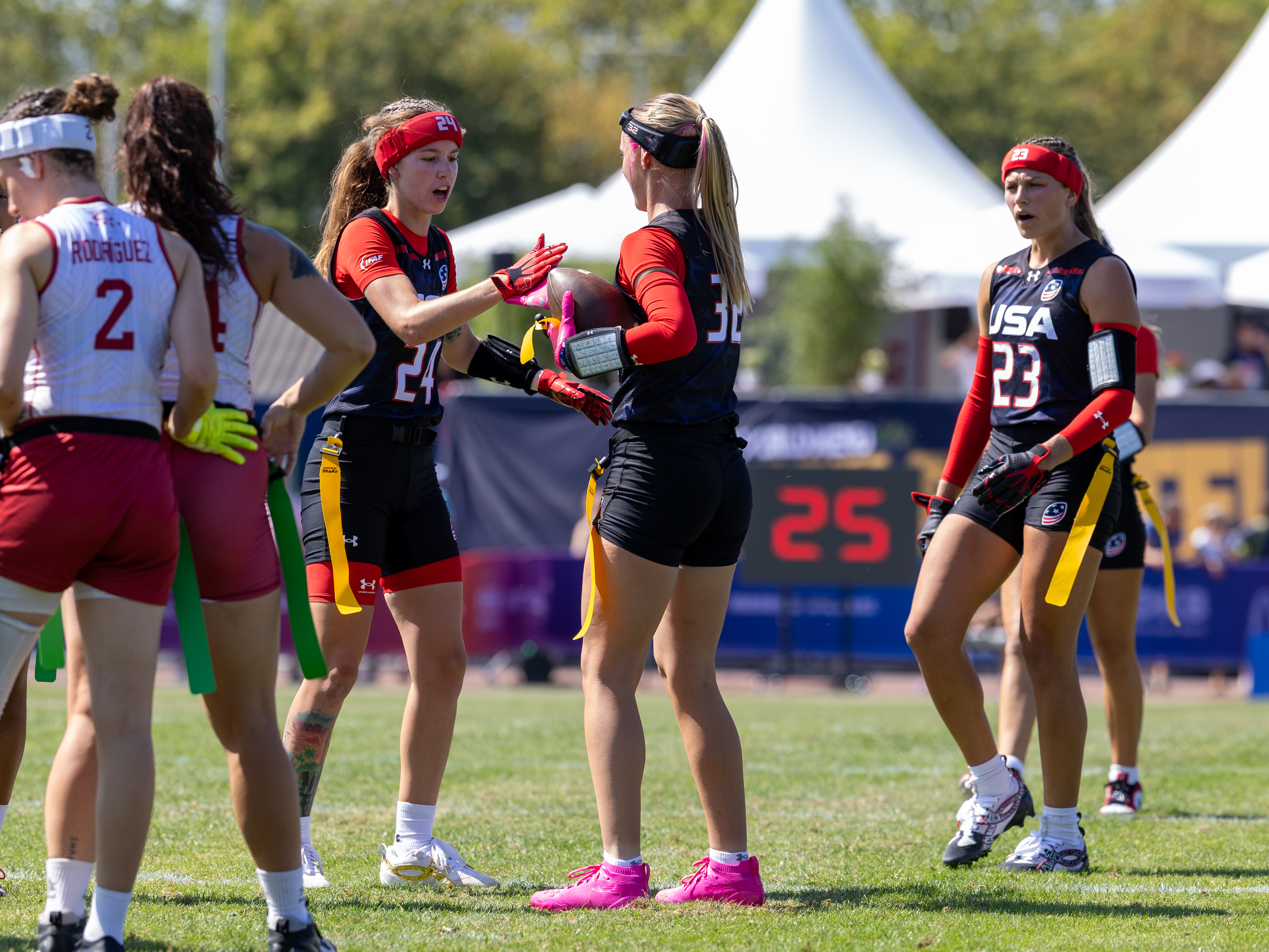 #24 Kennedy Foster (WR/DB) Team USA Women and #32 Ashlea Klam (C/S) Team USA Women touchdown celebration.