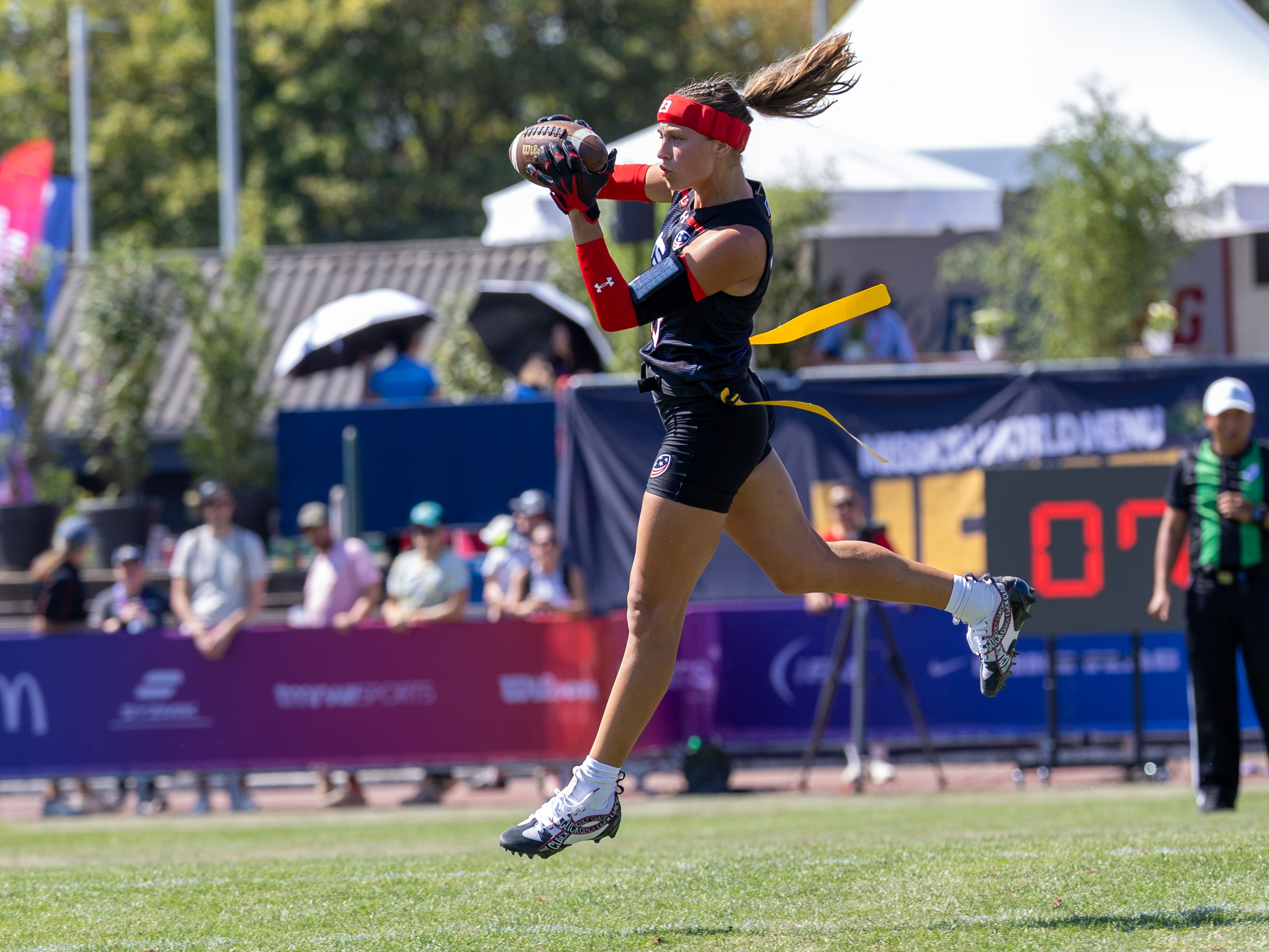 #21 NyKeeta Christopher (DB/WR) Team USA Women catch the ball in the air.