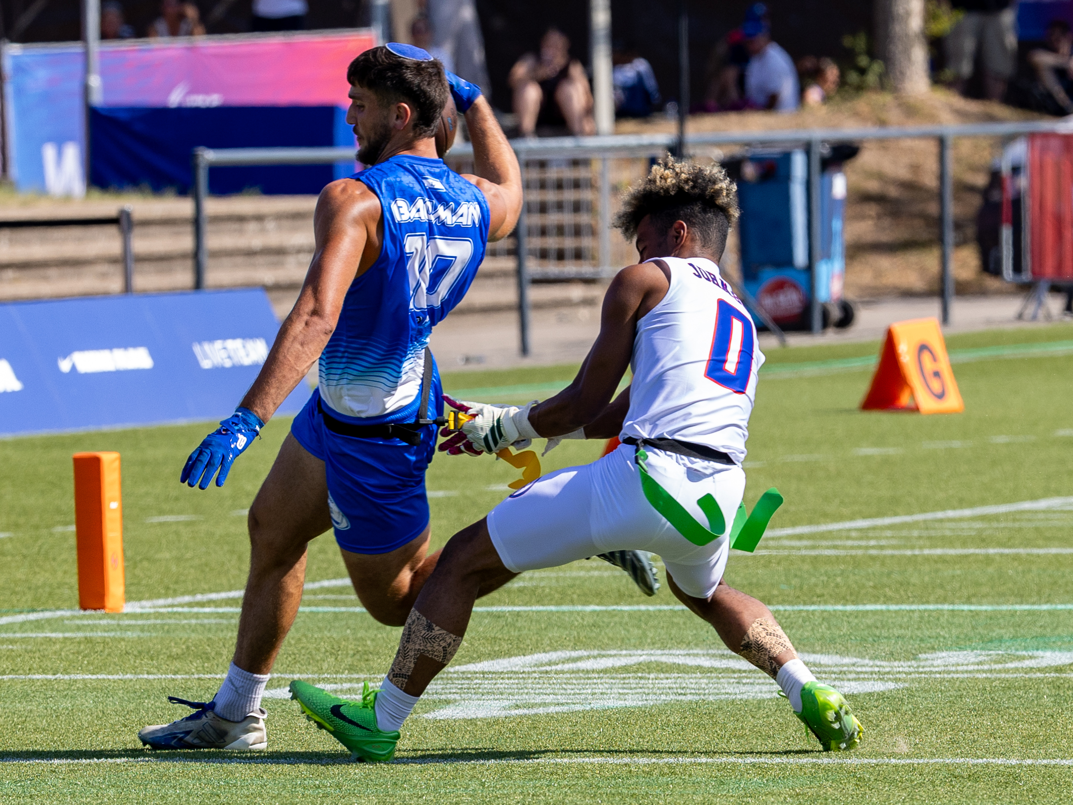 #0 Batchlor Wise Johnson IV (WR/DB) Team American Samoa Men catch the flag from #10 MATAN BAUMAN (WR) Team Israel Men