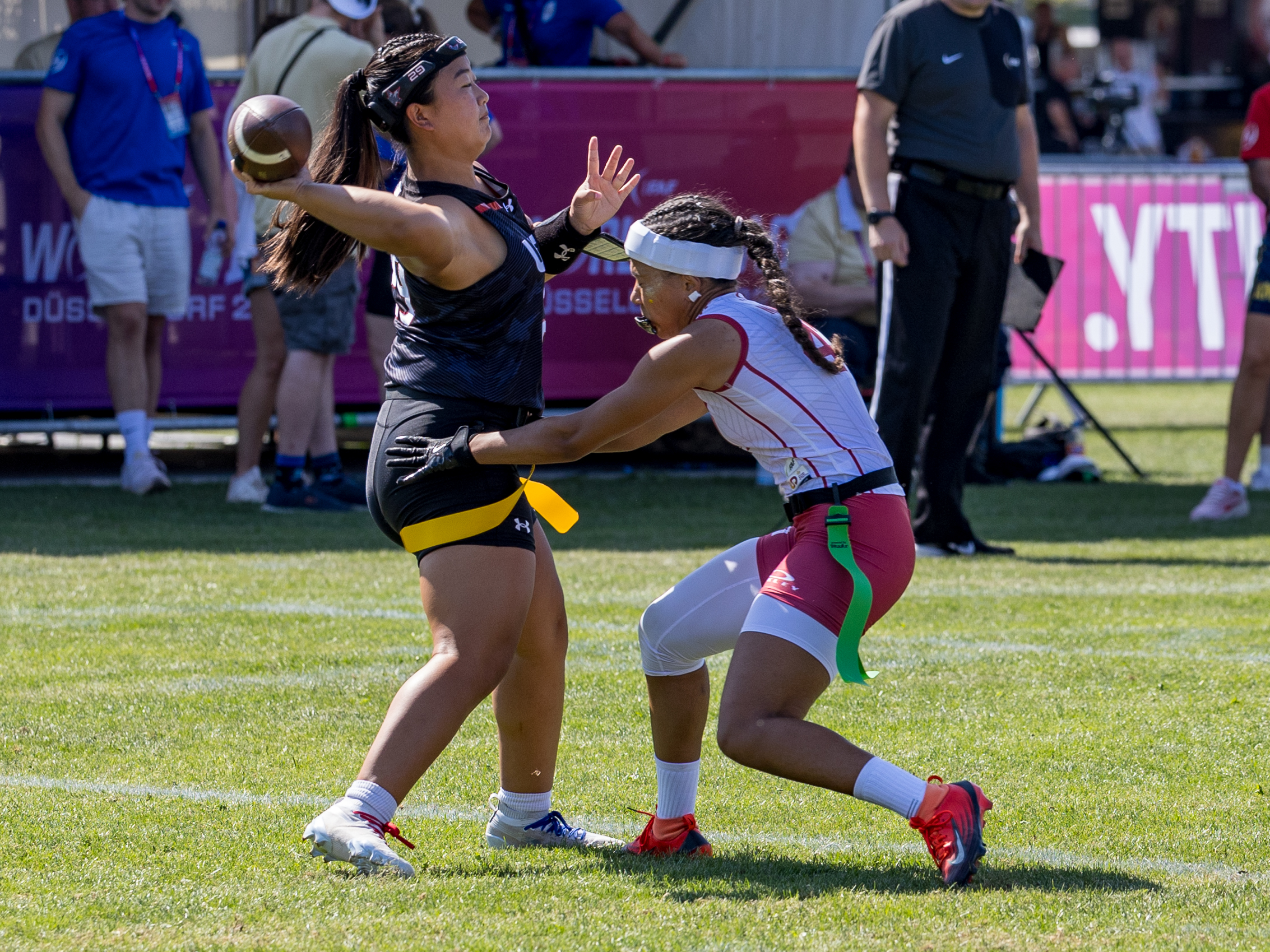 #29 Akemi Higa (QB) Team USA Women pass the ball.
