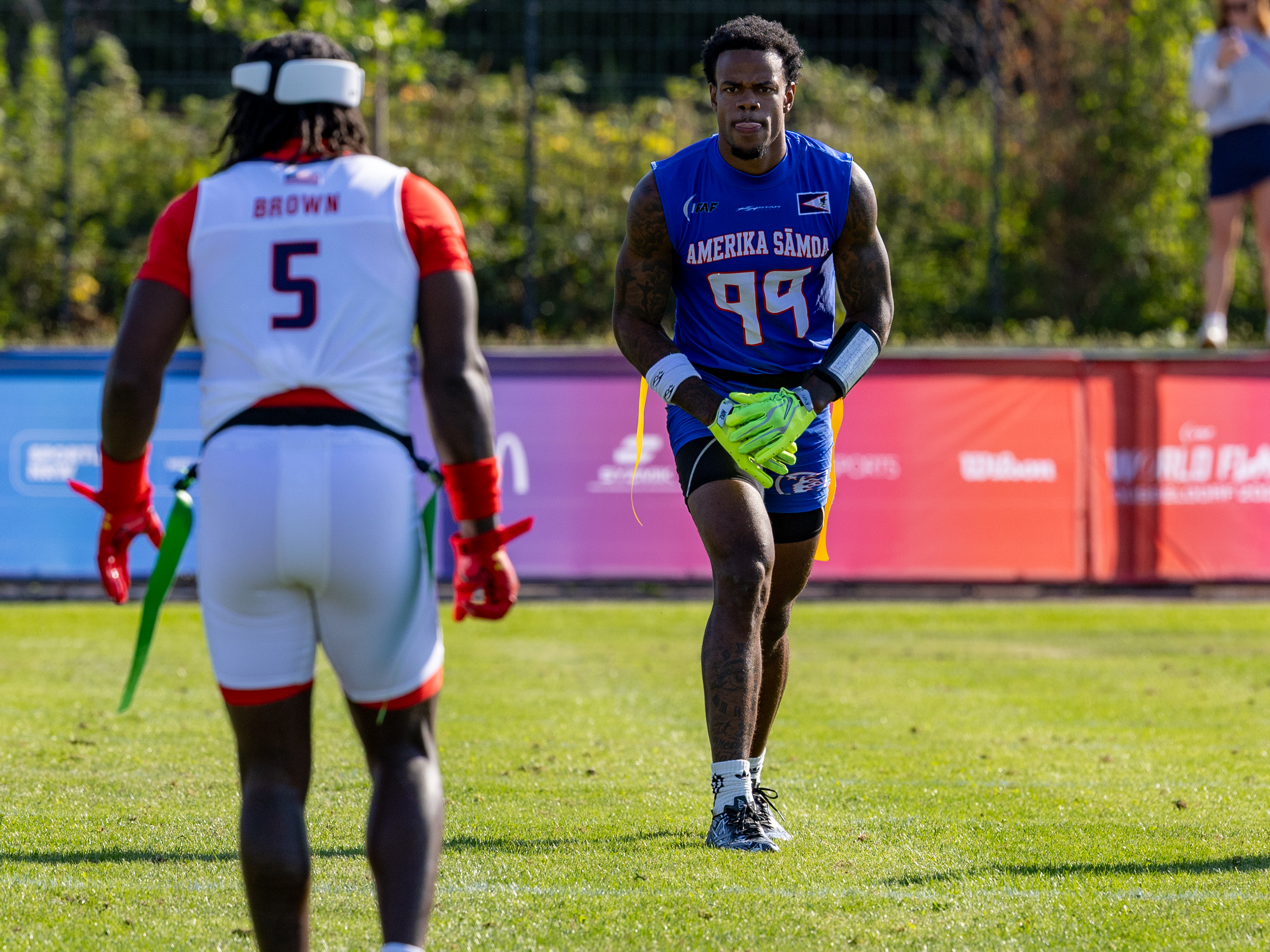#99 Bralon Brown (WR/DB) Team American Samoa Men wait for the snap.