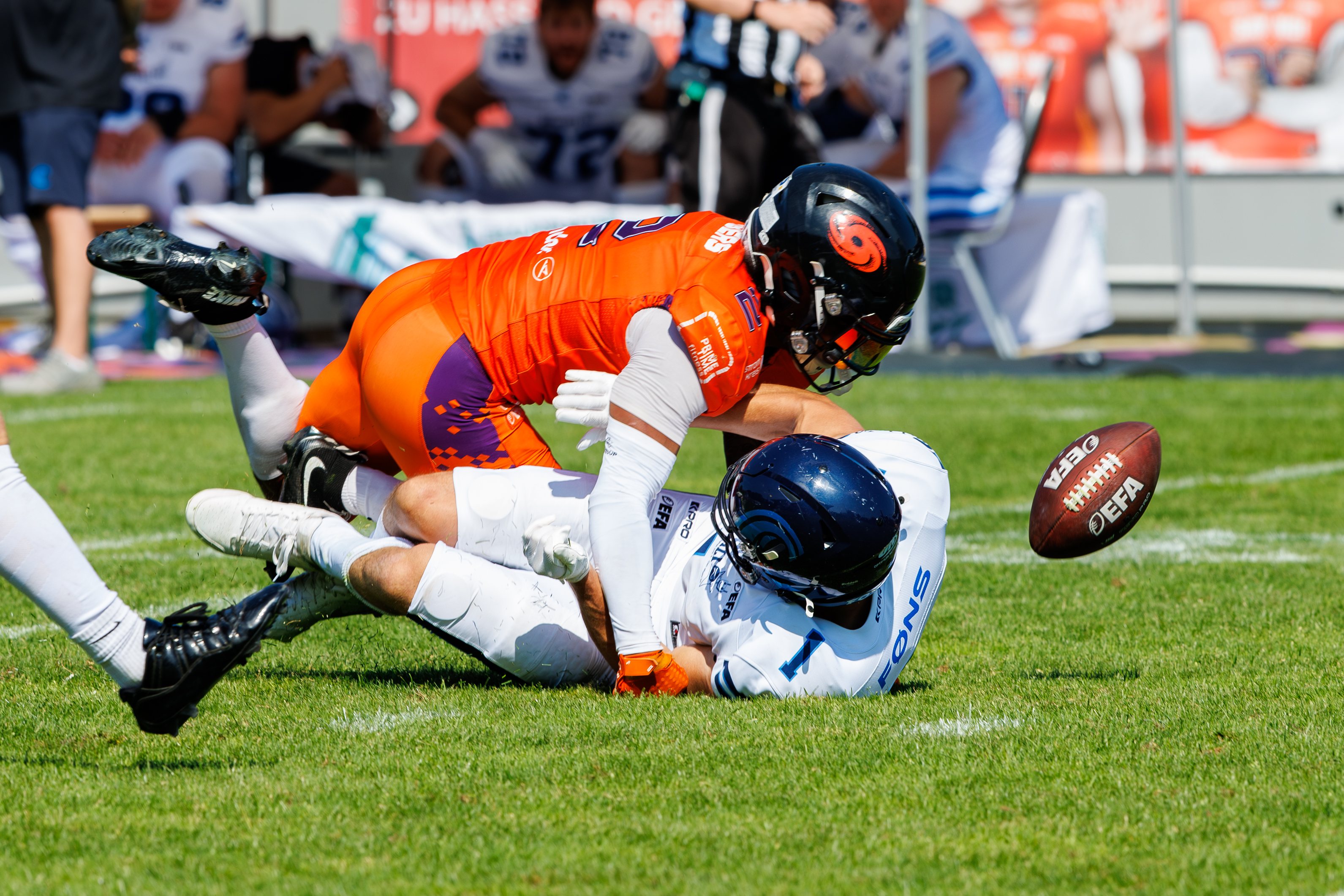 #2 Mason Chambers (Defensive Back) – Frankfurt Galaxy protect the ball at #1 Simon Føns (Wide Receiver) – Nordic Storm