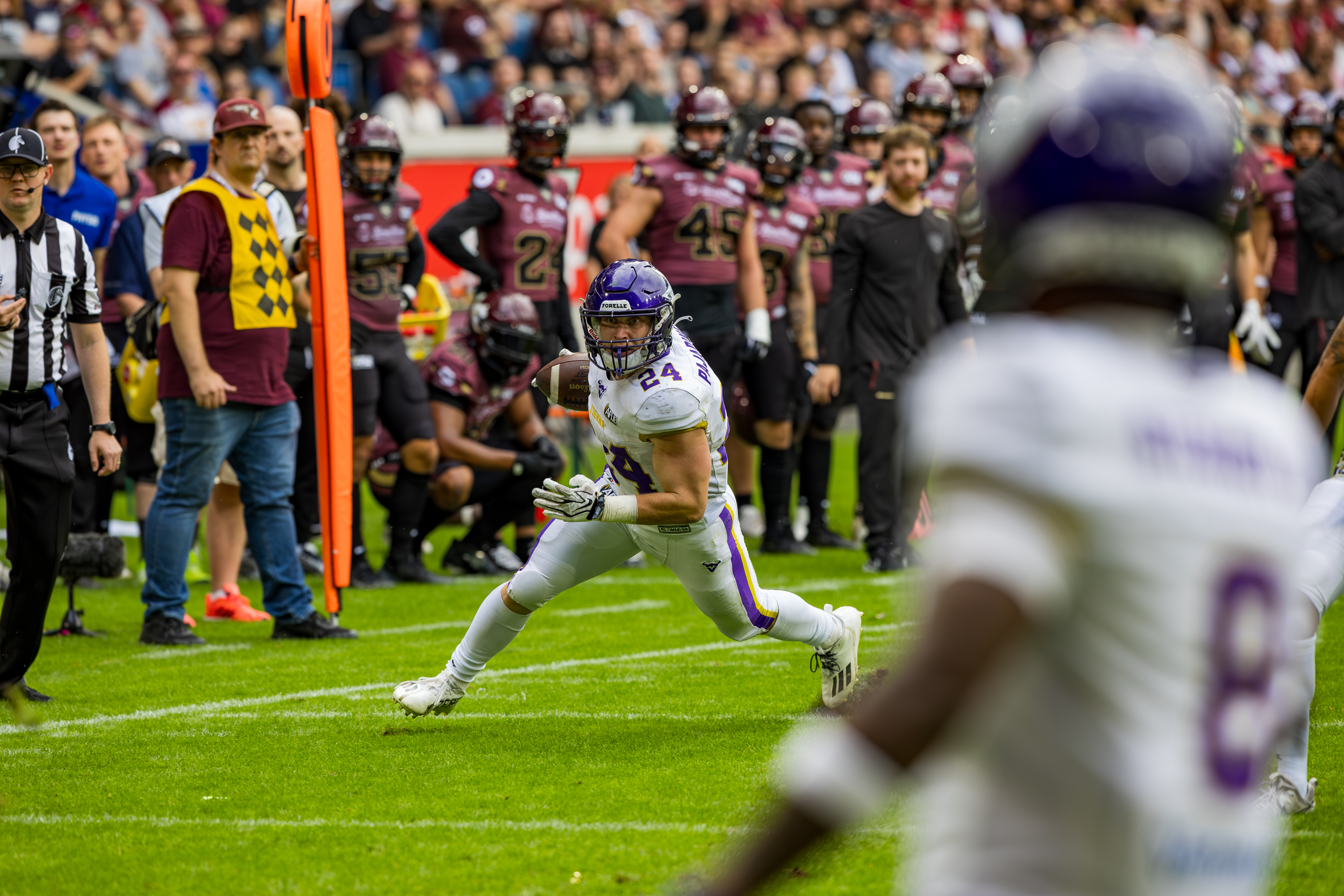 #24 Karri Pajarinen (Running Back) – Vienna Vikings run with the ball in the endzone.