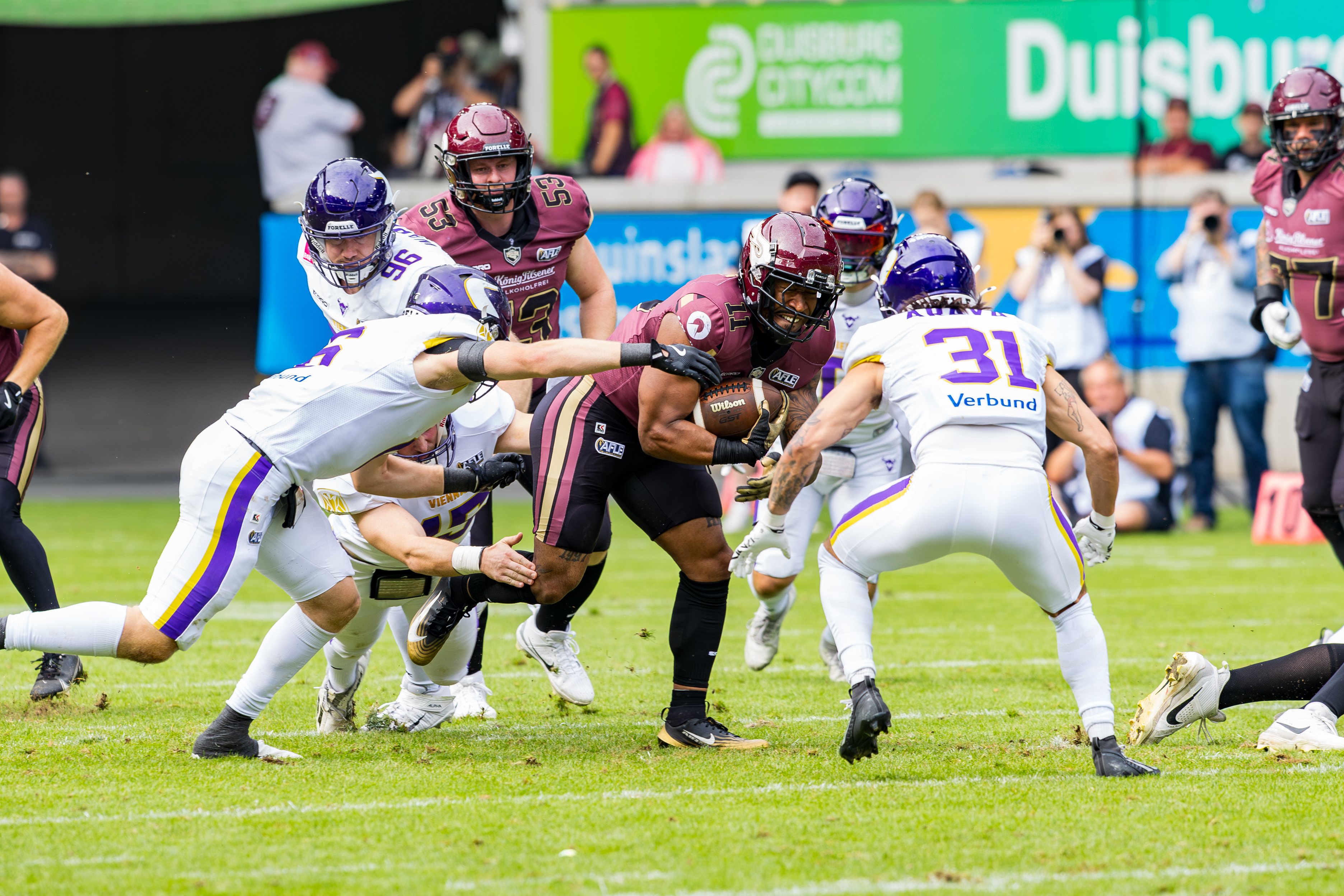 #6 Elmeri Laalo (Strong Safety / Free Safety) – Vienna Vikings and #45 Nikolaus Terlitza (Linebacker) – Vienna Vikings tackle #11 Jonathan Scott (Halfback) – Rhein Fire