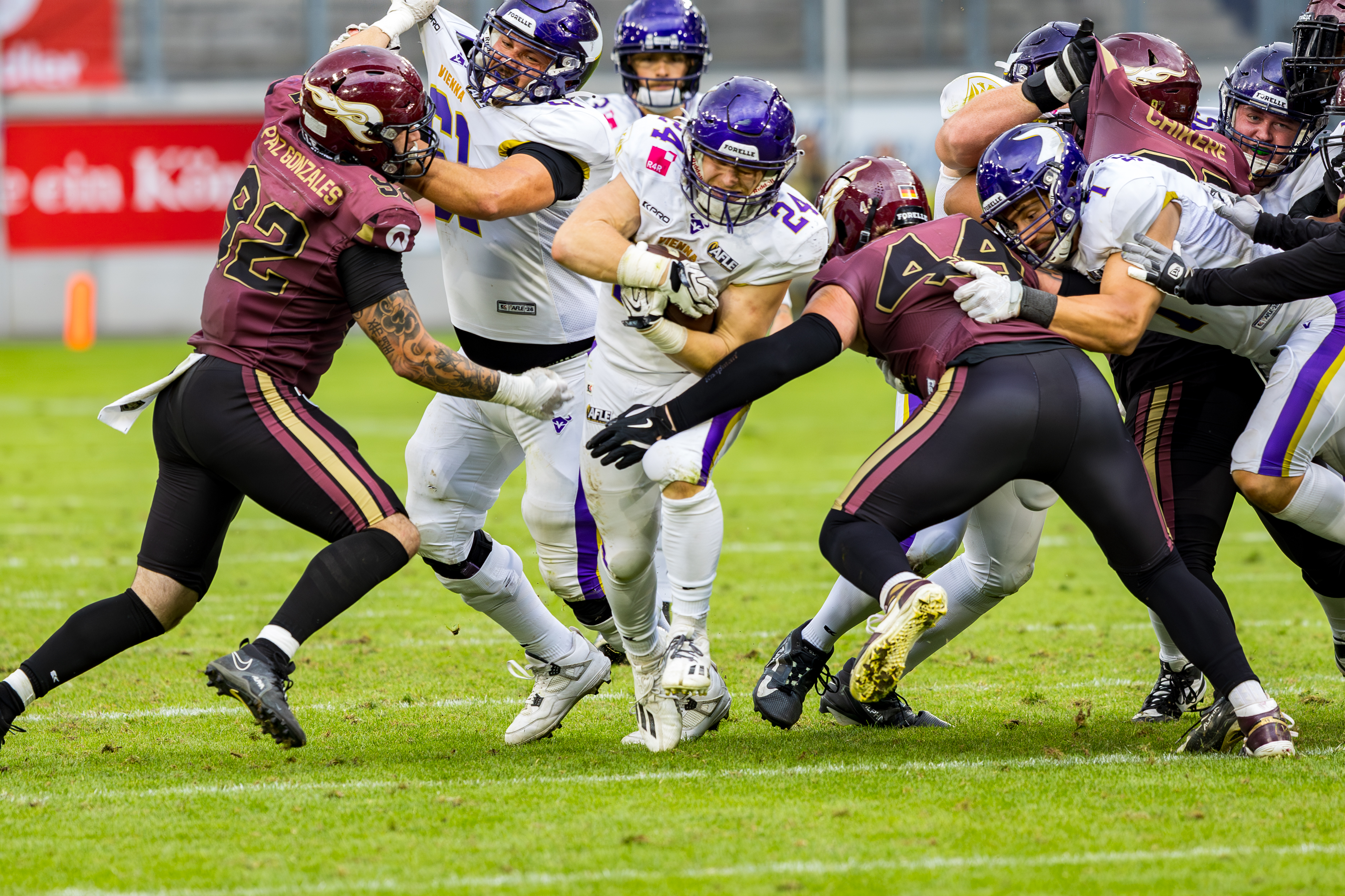#92 Diego Paz González (Defensive Line) – Rhein Fire and #44 Marius Kensy (Linebacker) – Rhein Fire block #24 Karri Pajarinen (Running Back) – Vienna Vikings