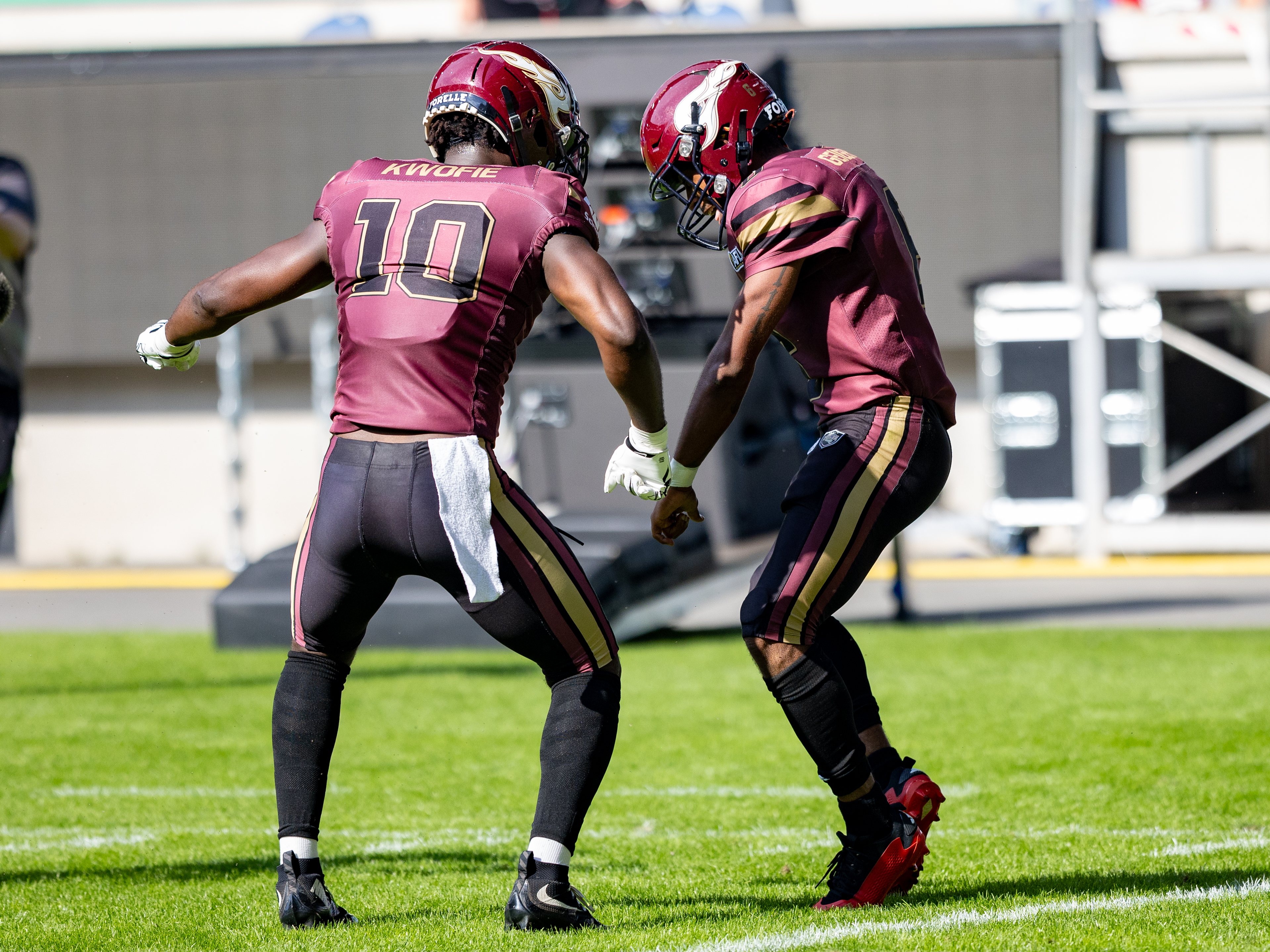 #10 Harlan Kwofie (Wide Receiver) – Rhein Fire and #6 Kaylon Geiger (Wide Receiver) – Rhein Fire touchdown celebration.