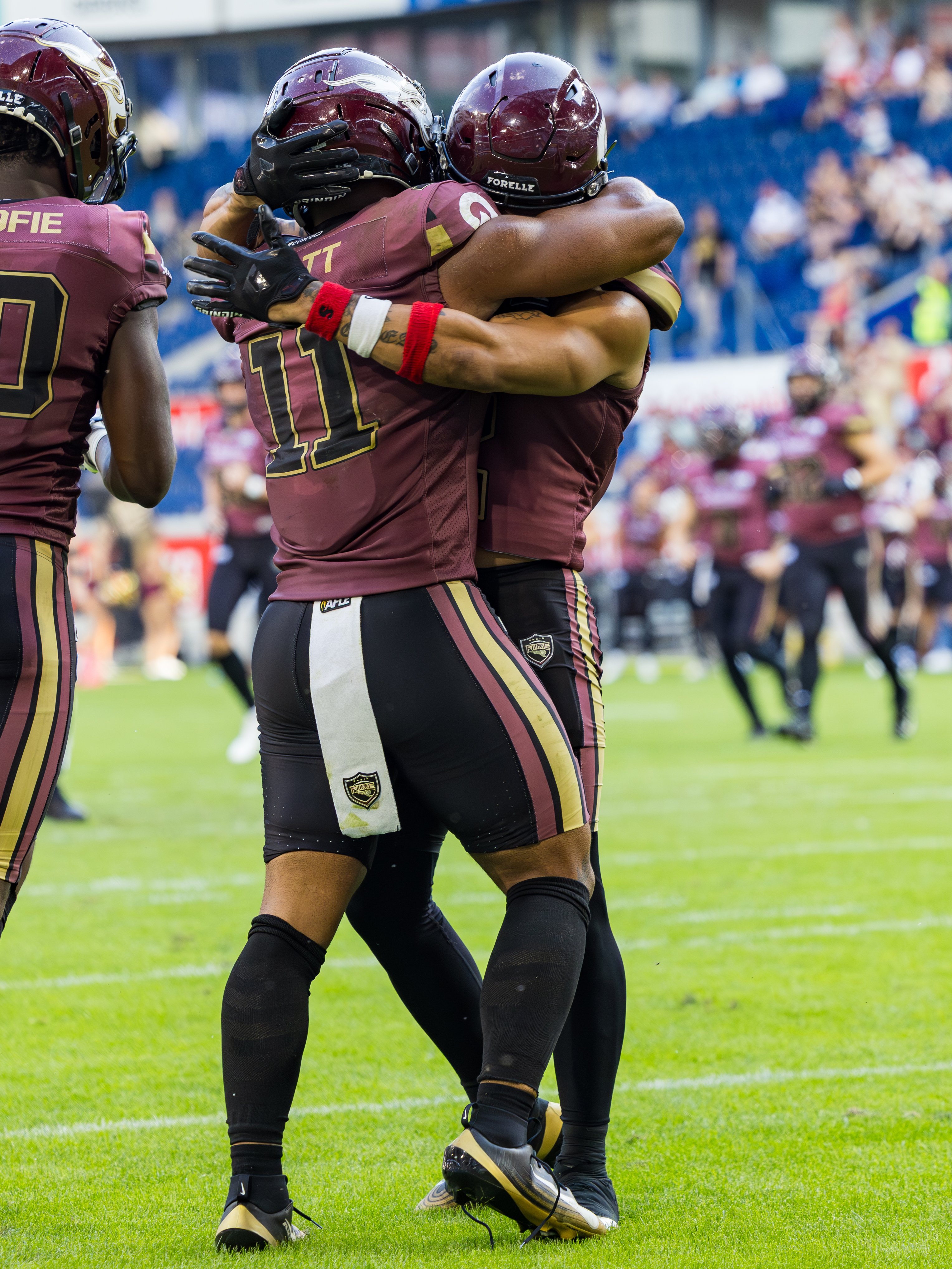 #11 Jonathan Scott (Running Back) – Rhein Fire and #2 Joshua Scott (Wide Receiver) – Rhein Fire celebration.