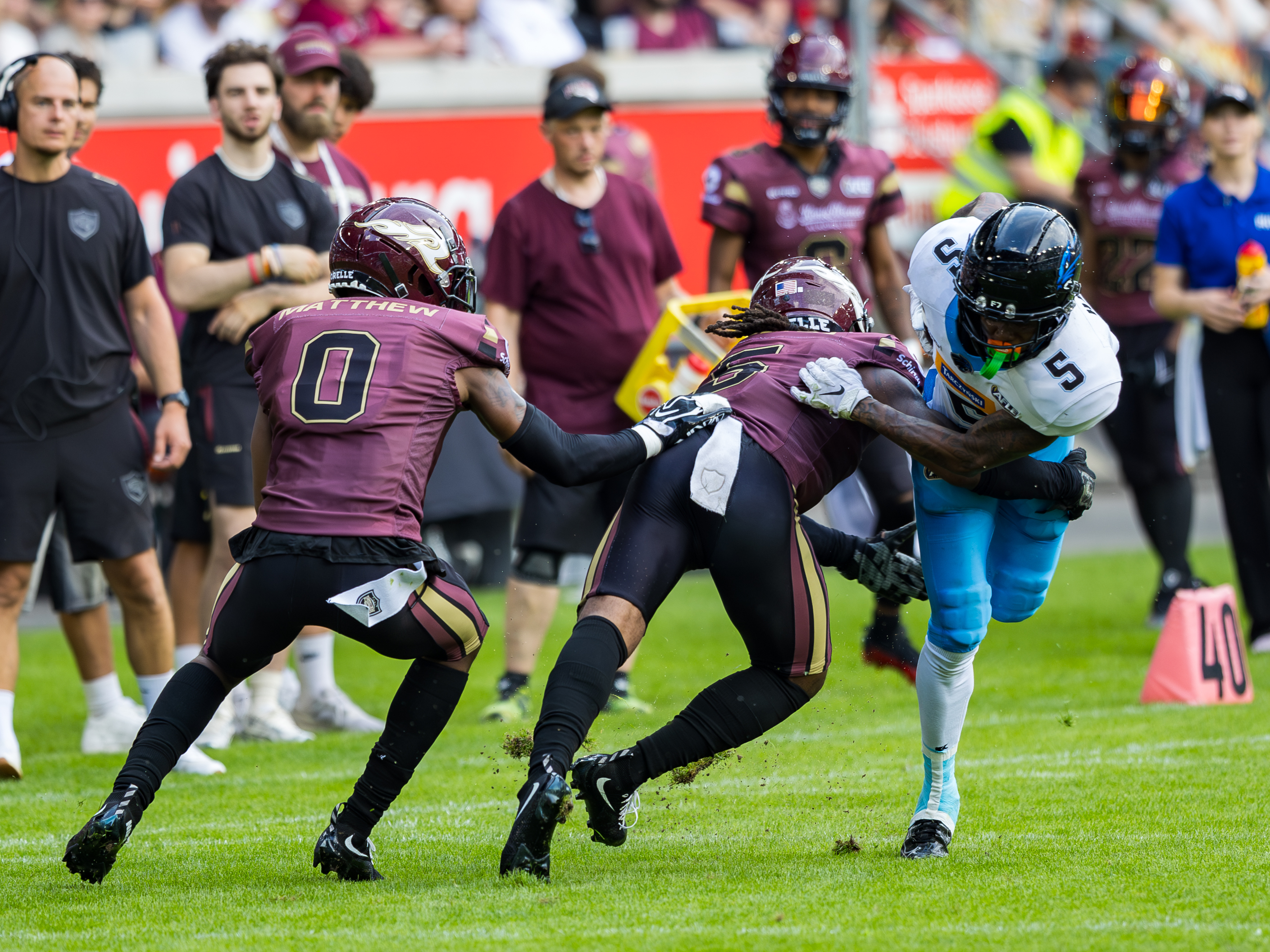 #0 Christian Matthew (Defensive Back) – Rhein Fire and #5 Nazir Streater (Strong Saftey) – Rhein Fire tackle #5 Michael Harley Jr (Wide Receiver) – Panthers Wroclaw