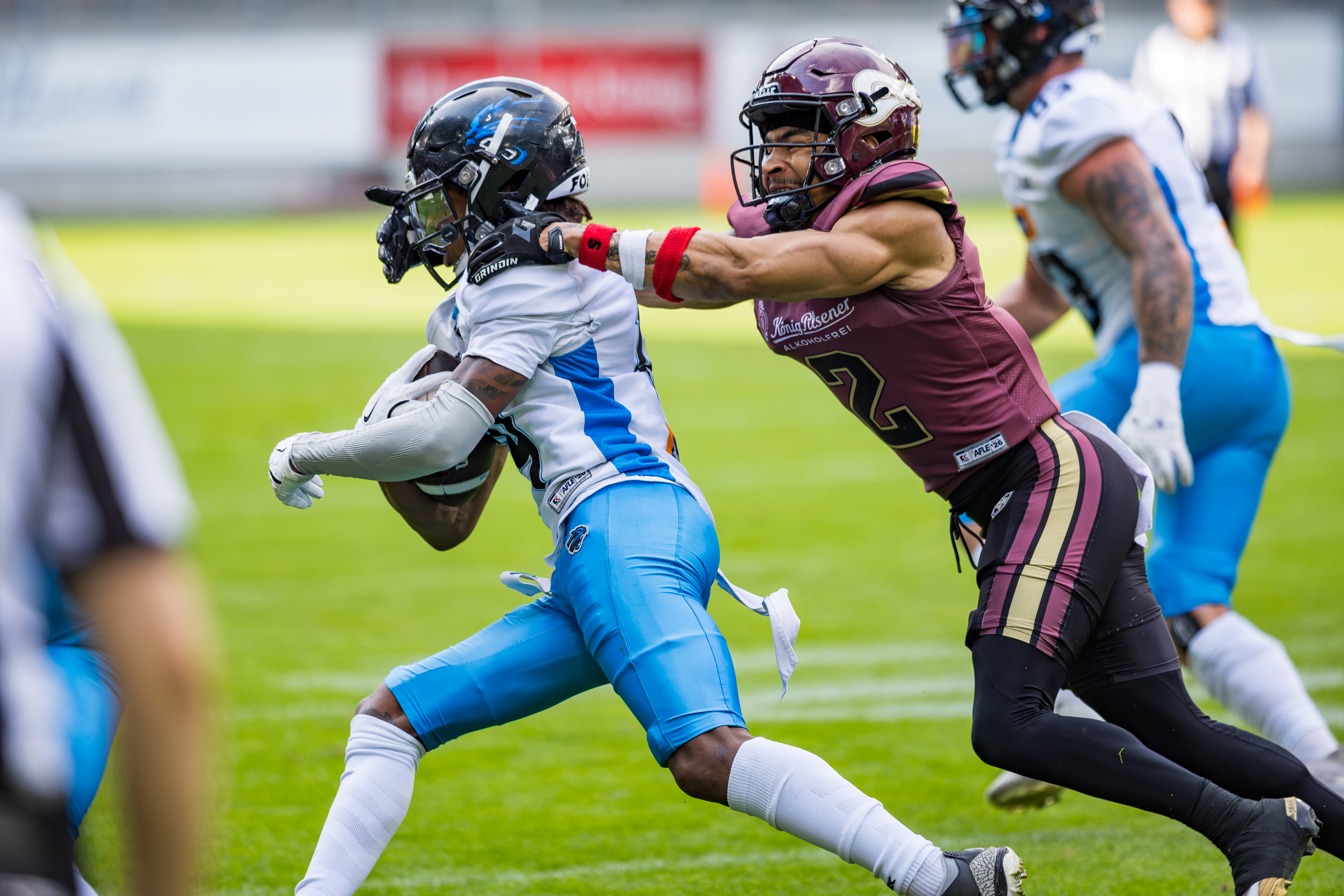 #2 Joshua Scott (Wide Receiver) – Rhein Fire tackle #9 Wojciech Simka ( Cornerback ) – Panthers Wroclaw after interception.