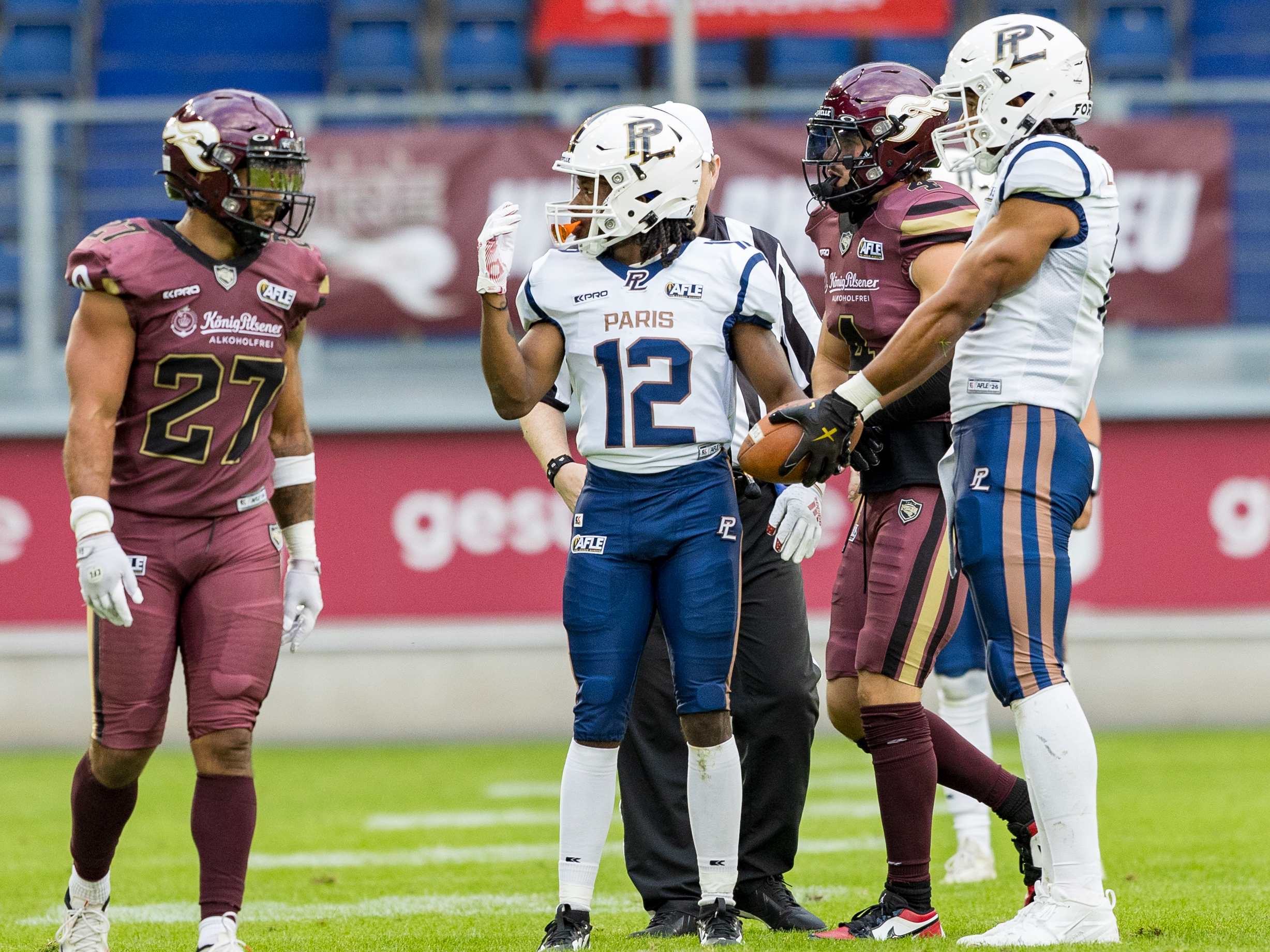 #12 Enzo Plumain (Wide Receiver) – Paris Lights talk to the refs. Rhein Fire vs Paris Lights, American Football, American Football League Europe, WEEK 4, 2026, 13.06.2026,