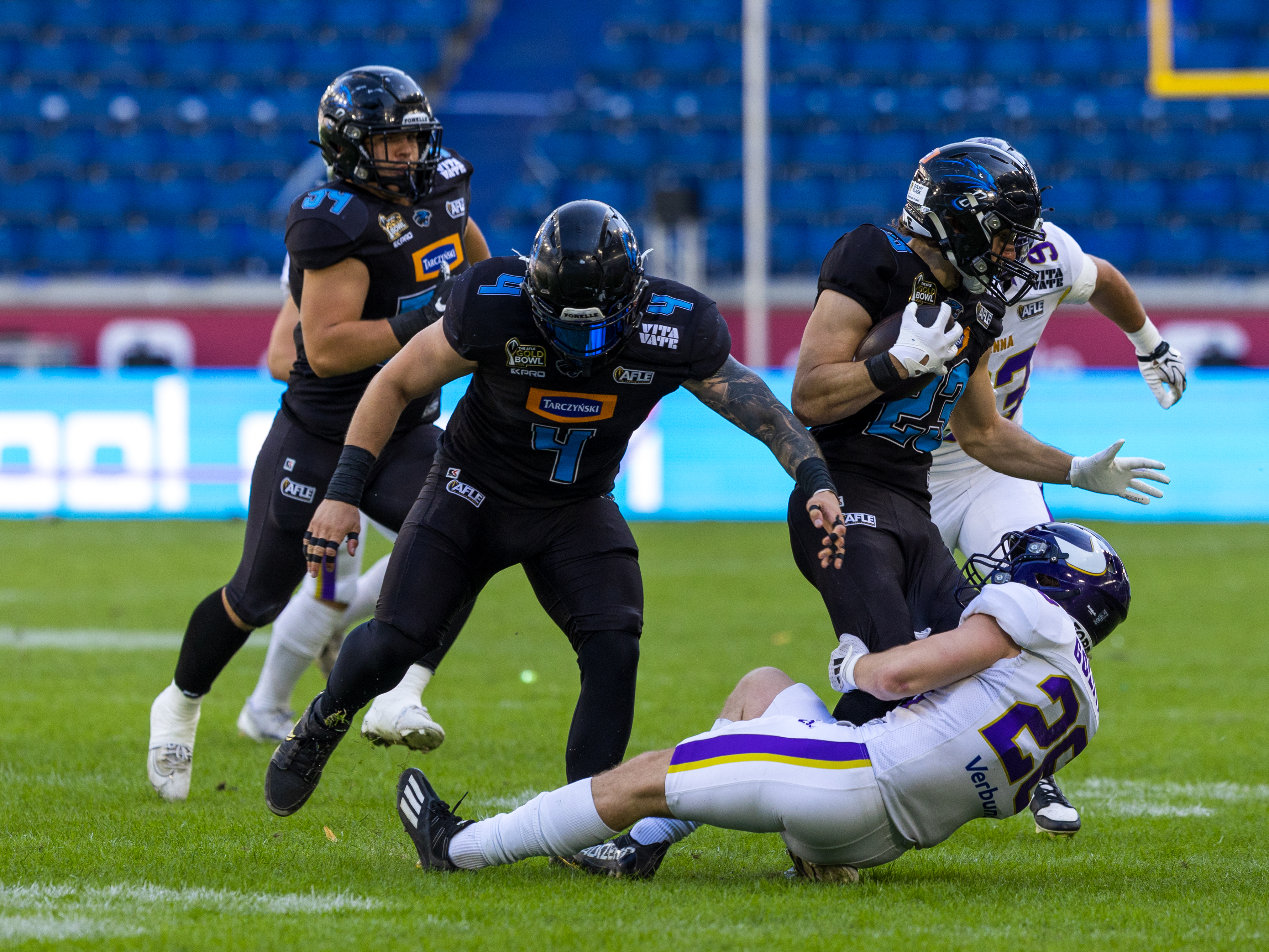 #26 Zoltan Golita (Cornerback) – Vienna Vikings tackle #23 Filip Suwada (Cornerback) – Panthers Wroclaw