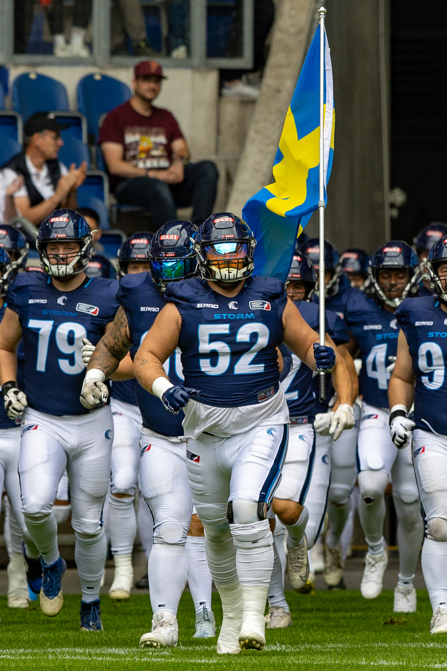 #52 David Strobel (OG) Nordic Storm with flag. Rhein Fire vs Nordic Storm, American Football, European League of Football, Week 14, 2025, 17.08.2025,
