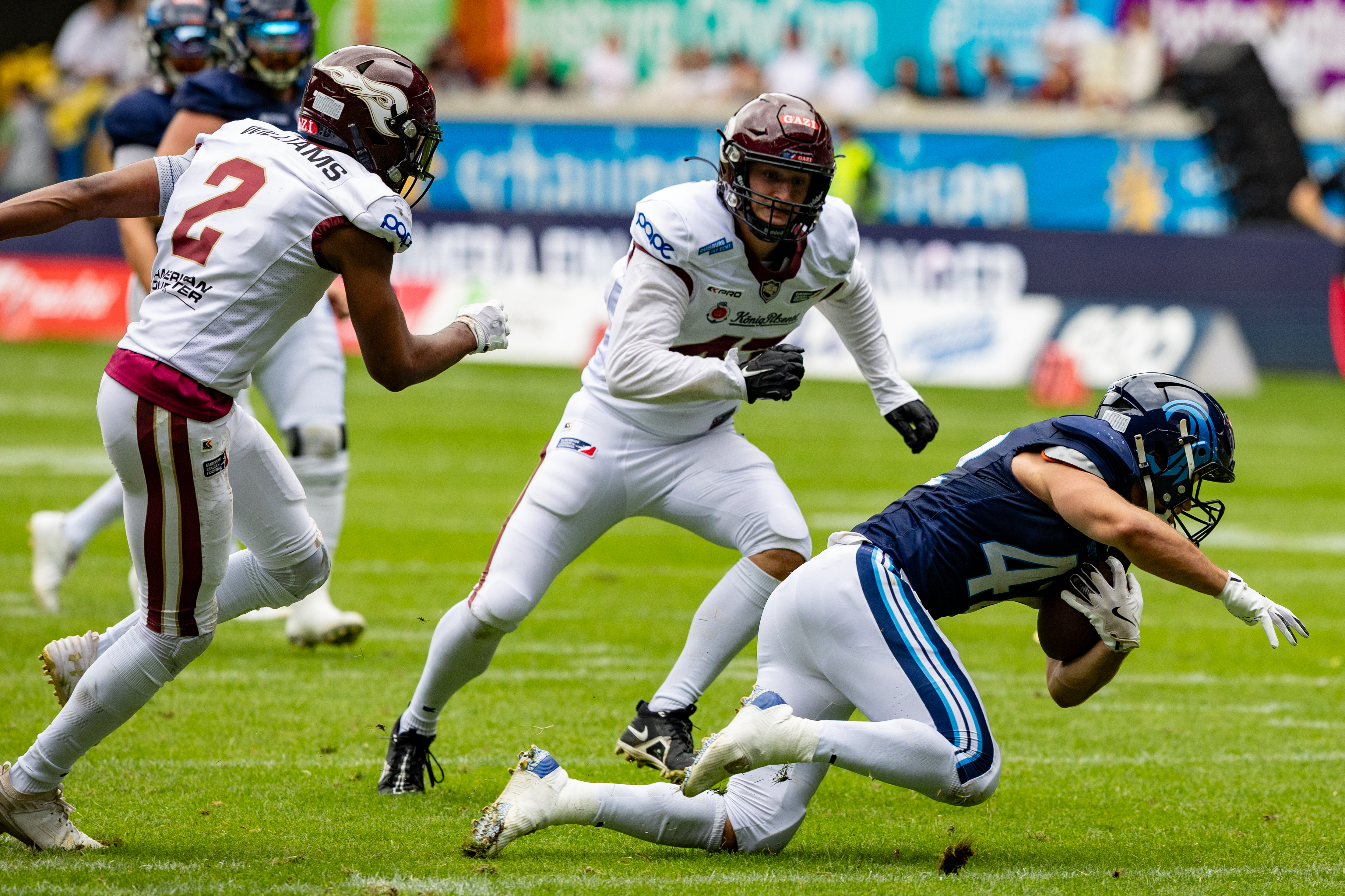 #42 Armand Soulerot (RB) Nordic Storm followed by #2 Omari Williams (FS) Rhein Fire and #41 Liam Kling (DE) Rhein Fire. Rhein Fire vs Nordic Storm, American Football, European League of Football, Week 14, 2025, 17.08.2025,