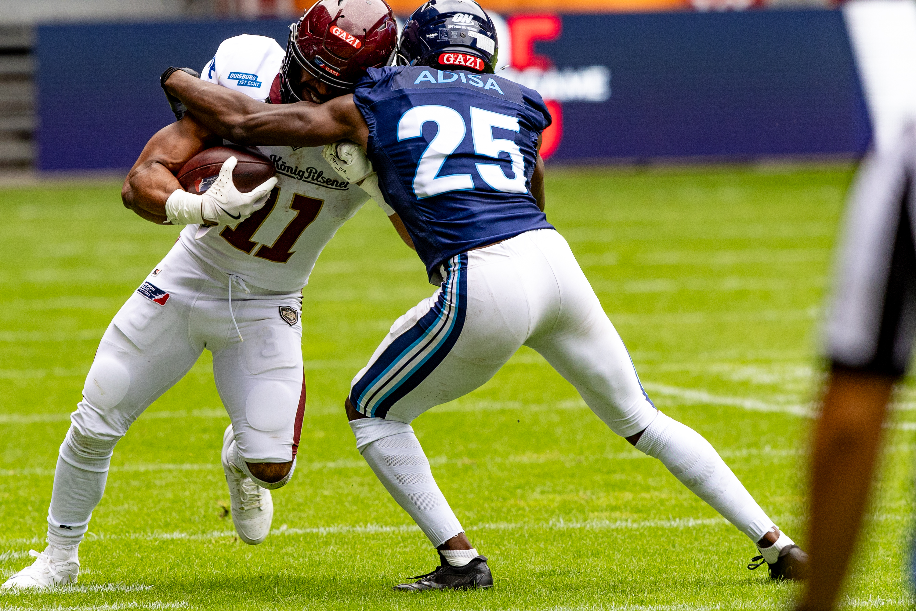 #25 Khalid Adisa (CB) Nordic Storm tackle #11 Jonathan Scott (RB) Rhein Fire Rhein Fire vs Nordic Storm, American Football, European League of Football, Week 14, 2025, 17.08.2025,