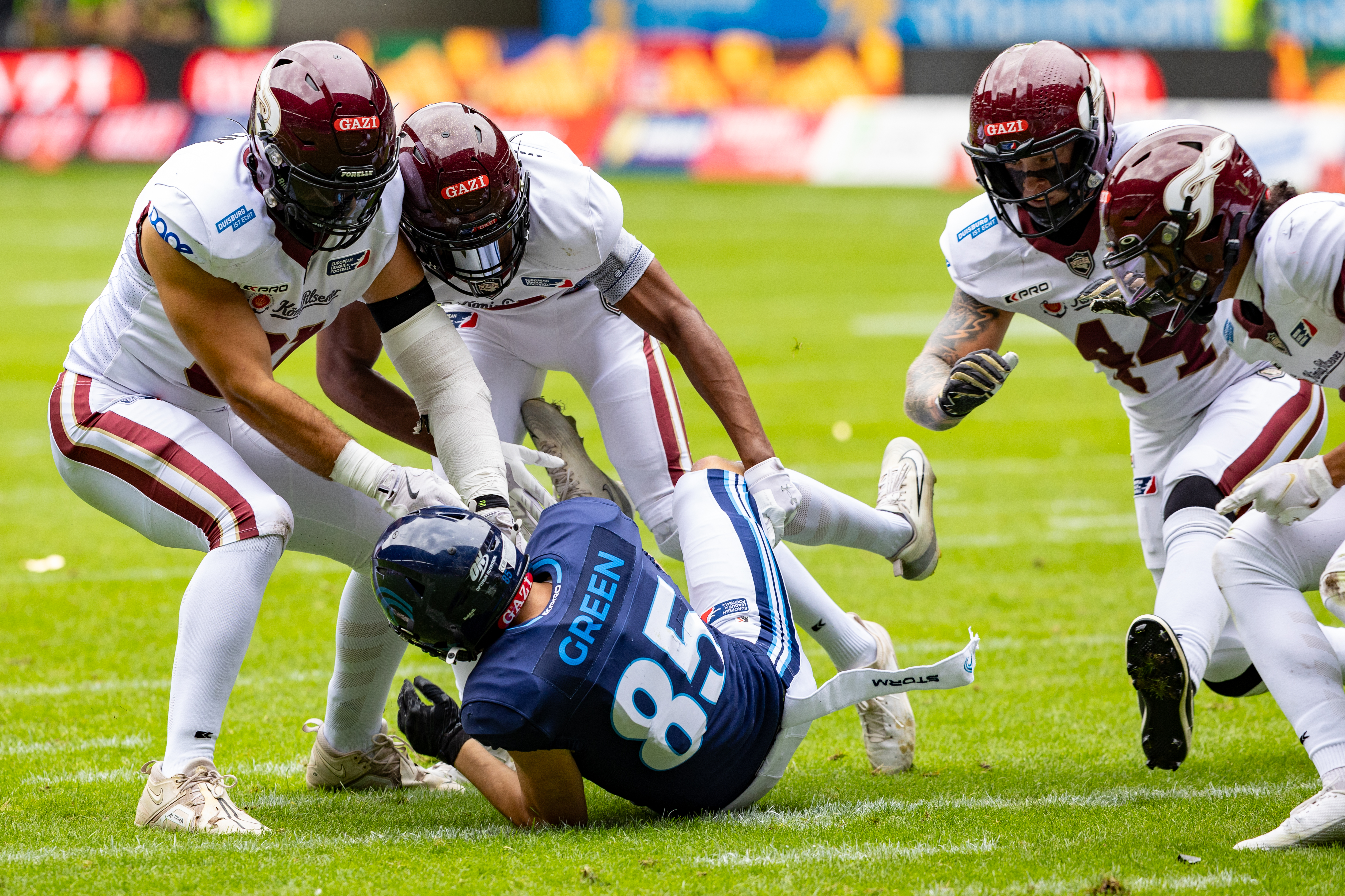 #31 Flamur Simon (LB) Rhein Fire and #2 Omari Williams (FS) Rhein Fire tackle #85 Jakob Green (WR) Nordic Storm. Rhein Fire vs Nordic Storm, American Football, European League of Football, Week 14, 2025, 17.08.2025,